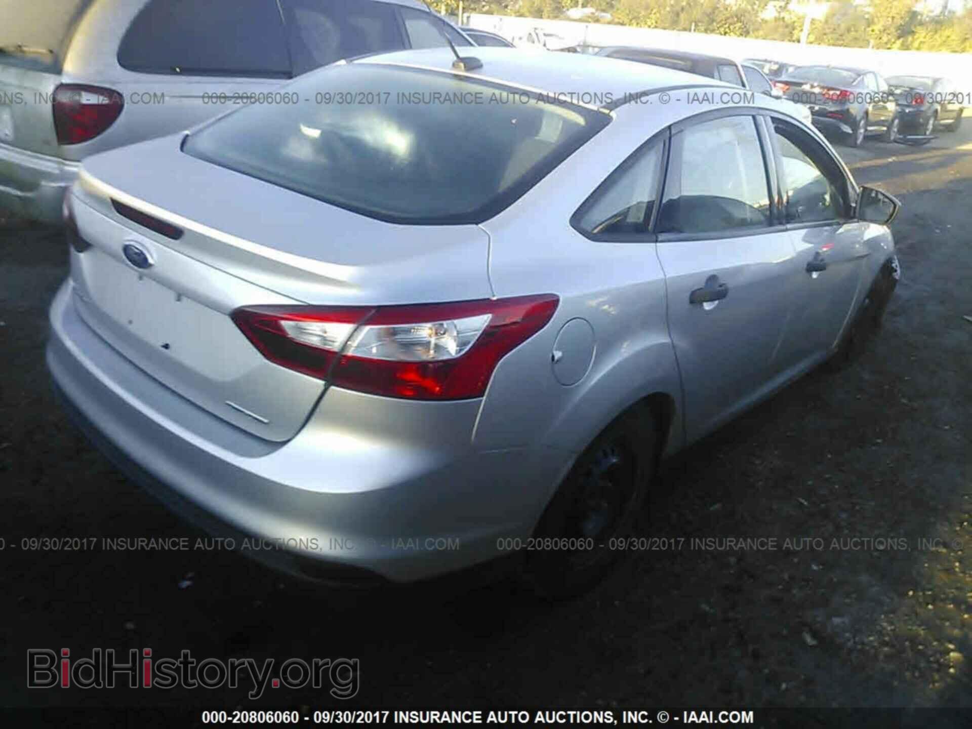 2014 Ford Focus - VIN: 1FADP3E20EL194453 - Фото 4