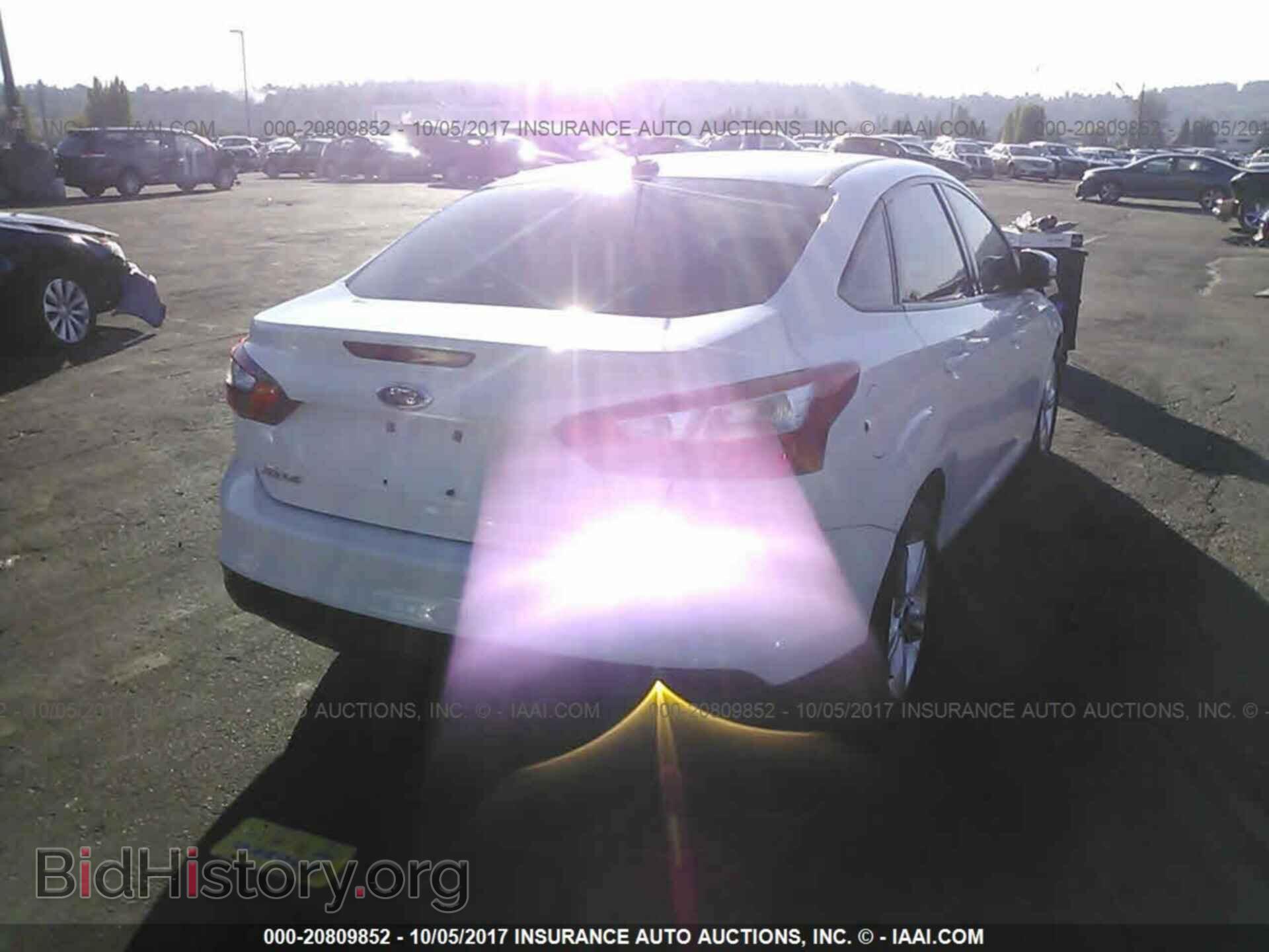 2014 Ford Focus - VIN: 1FADP3F23EL150218 - Фото 4