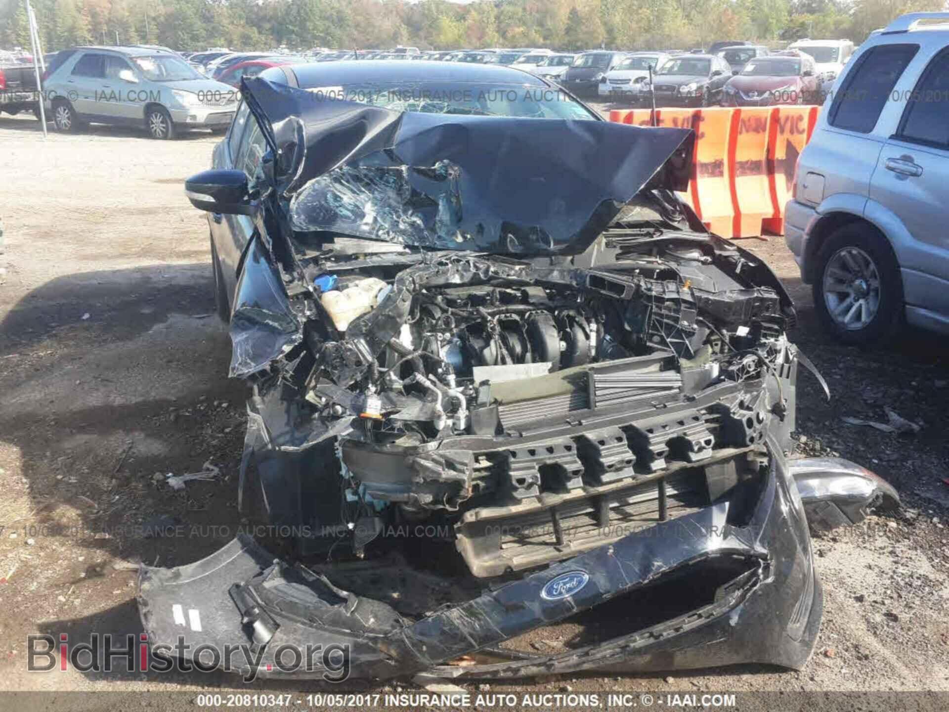 2016 Ford Focus - VIN: 1FADP3K2XGL324357 - Фото 6