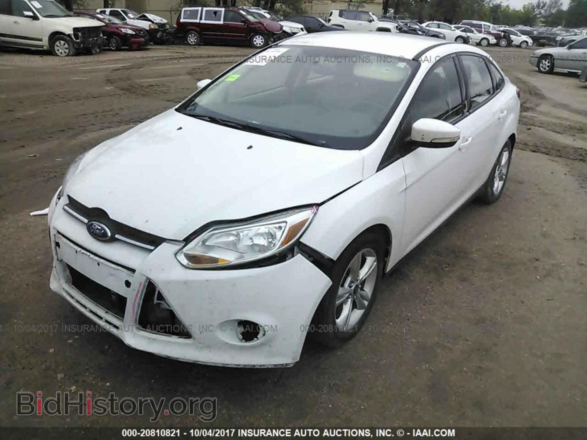 2014 Ford Focus - VIN: 1FADP3F21EL162979 - Photo 2