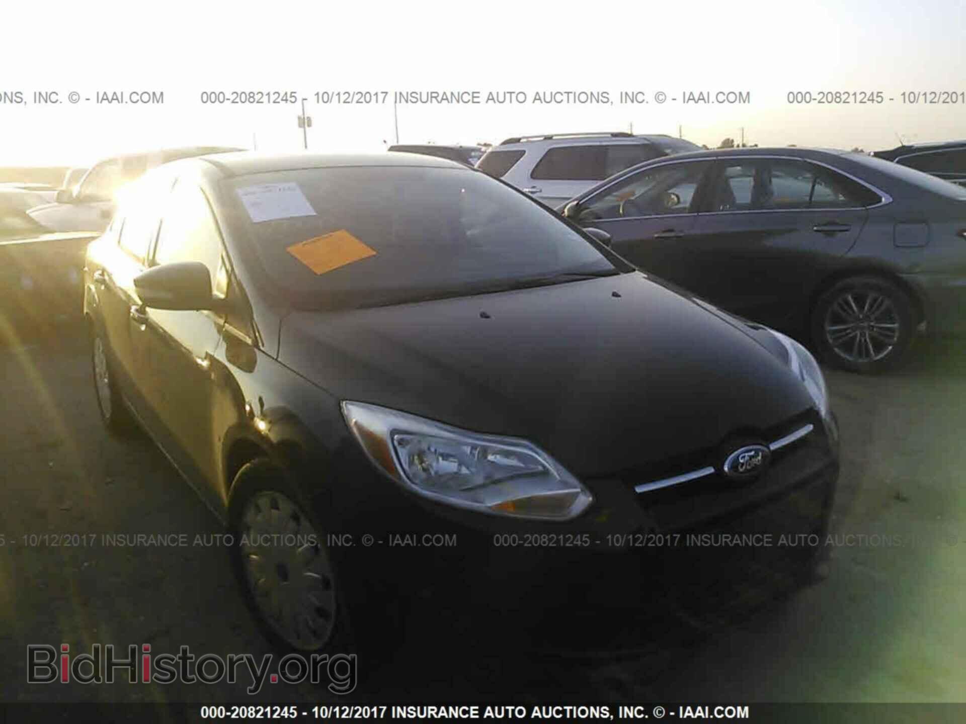 Фотография 1FADP3F26EL419599 - Ford Focus 2014