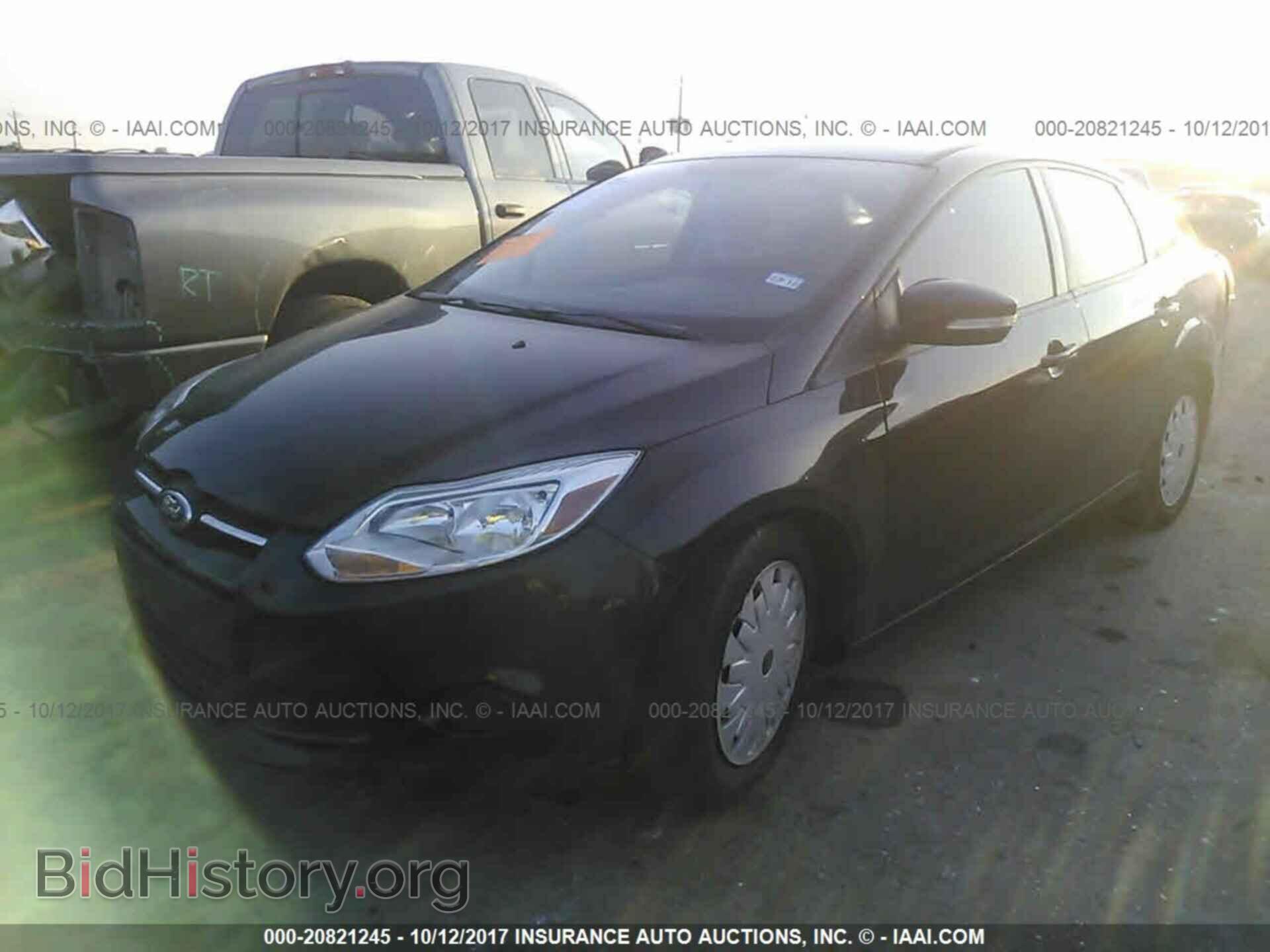 2014 Ford Focus - VIN: 1FADP3F26EL419599 - Фото 2