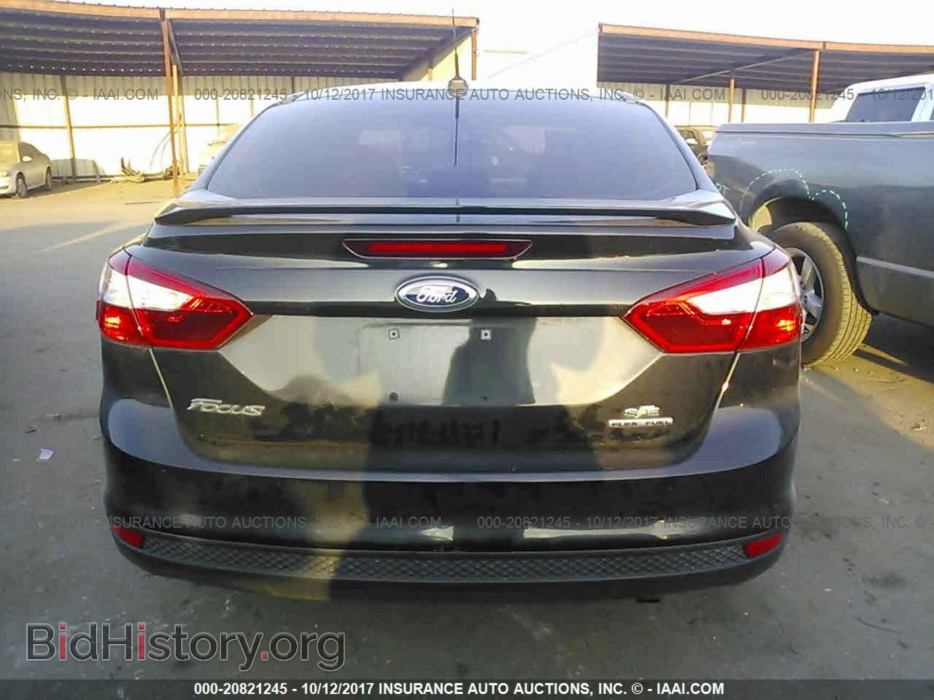 2014 Ford Focus - VIN: 1FADP3F26EL419599 - Фото 6