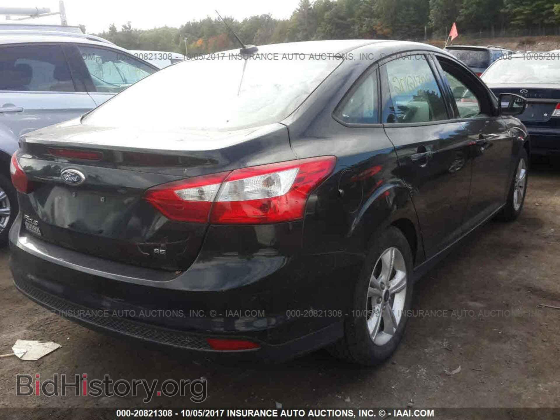2013 Ford Focus - VIN: 1FADP3F2XDL304812 - Photo 4