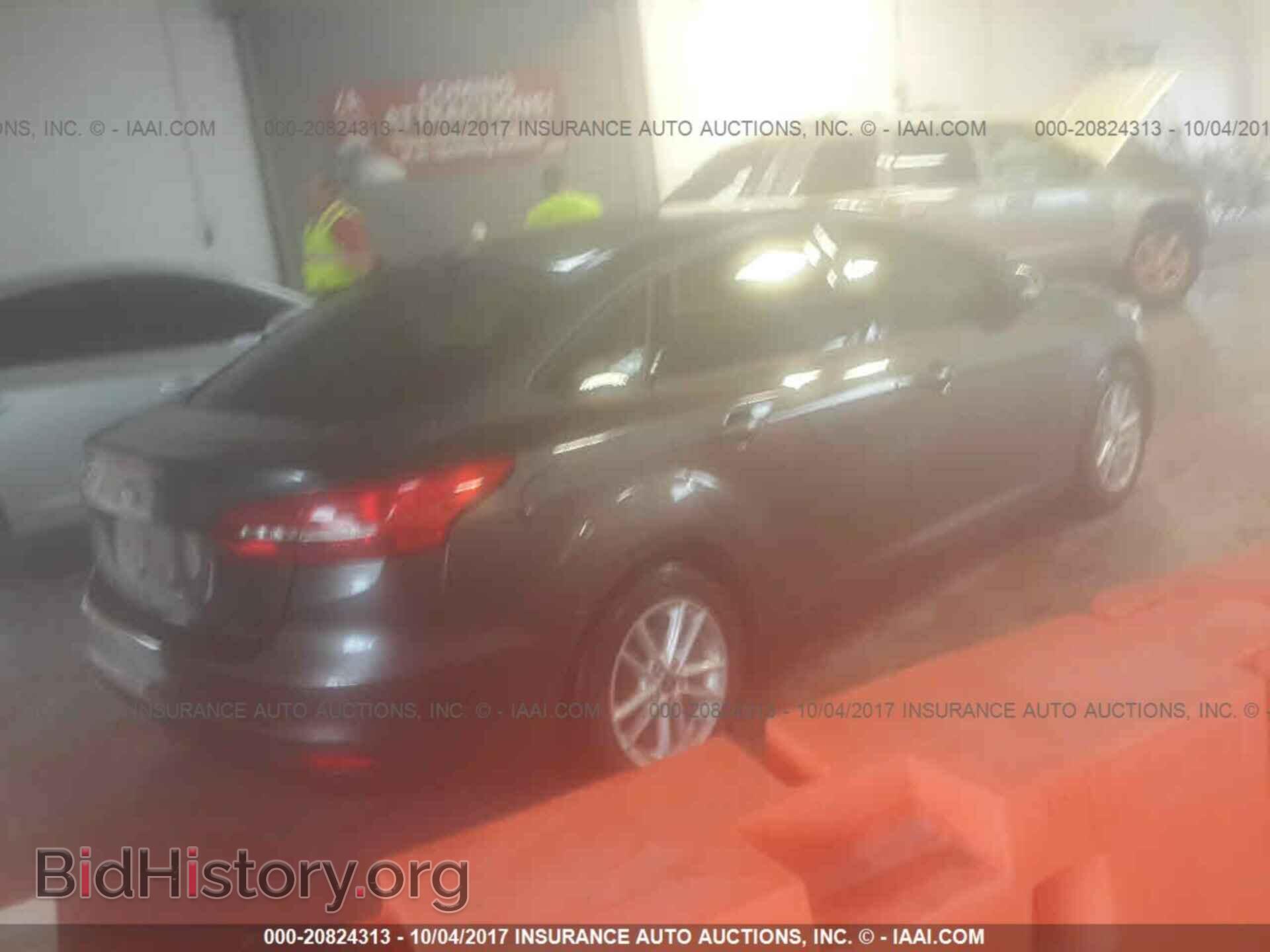 2016 Ford Focus - VIN: 1FADP3F23GL360322 - Photo 4