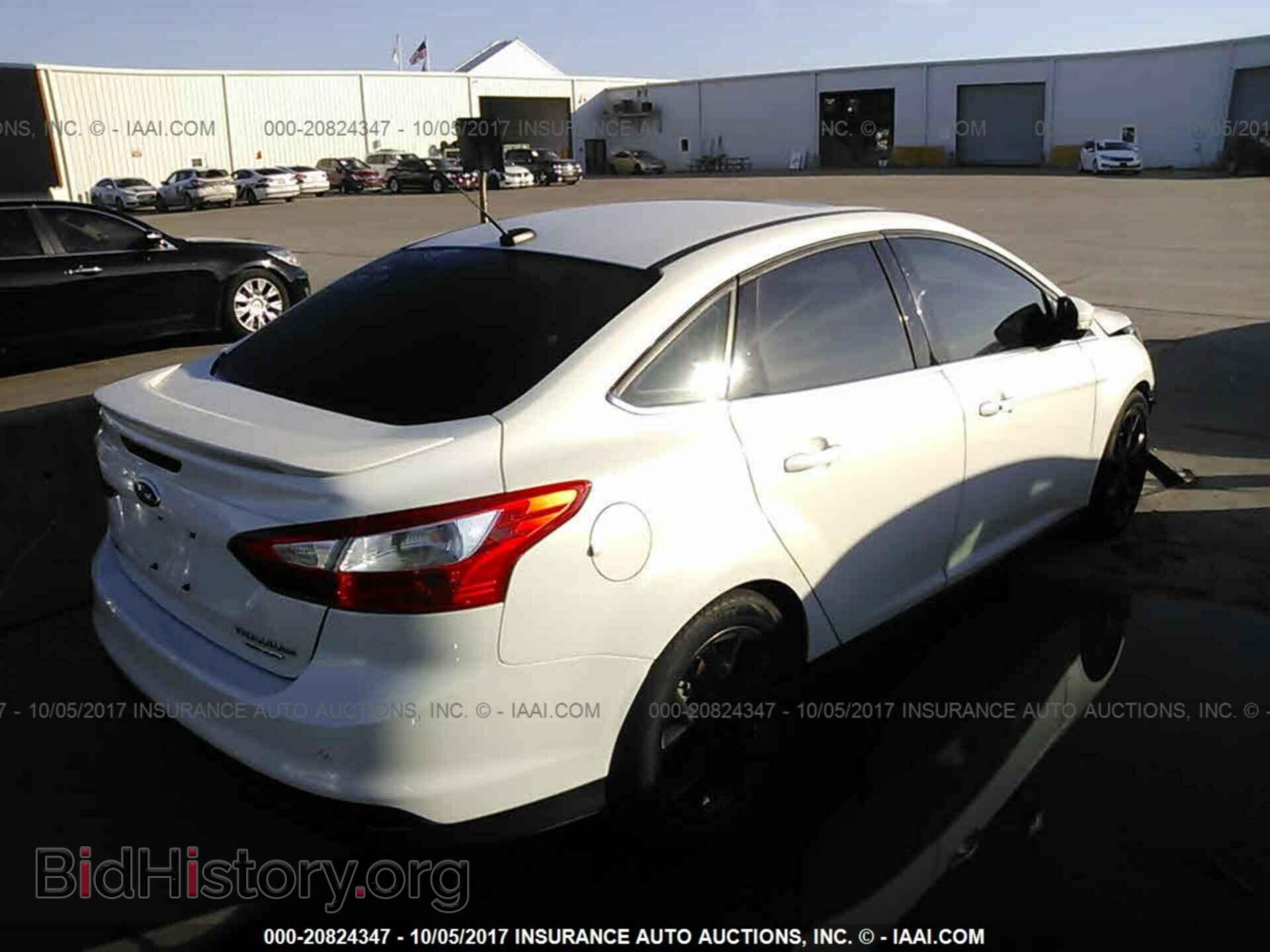 2014 Ford Focus - VIN: 1FADP3J27EL439870 - Фото 4