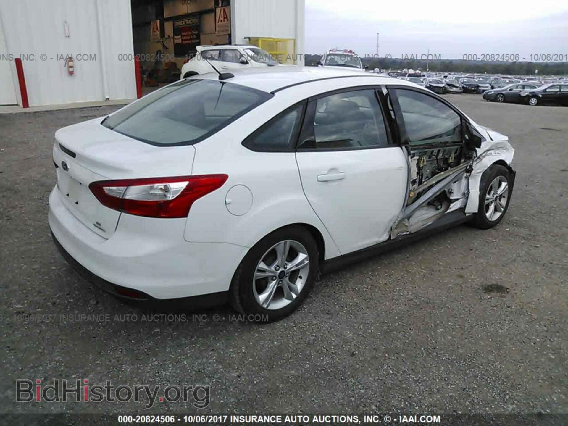 2014 Ford Focus - VIN: 1FADP3F27EL123202 - Photo 4
