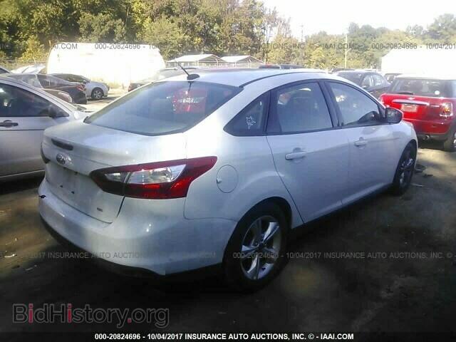 2014 Ford Focus - VIN: 1FADP3F28EL216617 - Photo 4