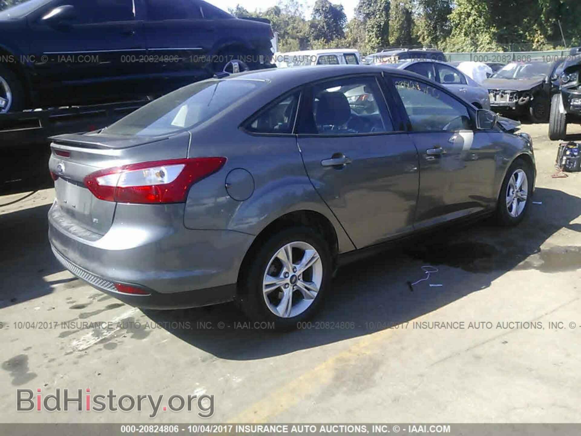 2012 Ford Focus - VIN: 1FAHP3F2XCL390672 - Photo 4