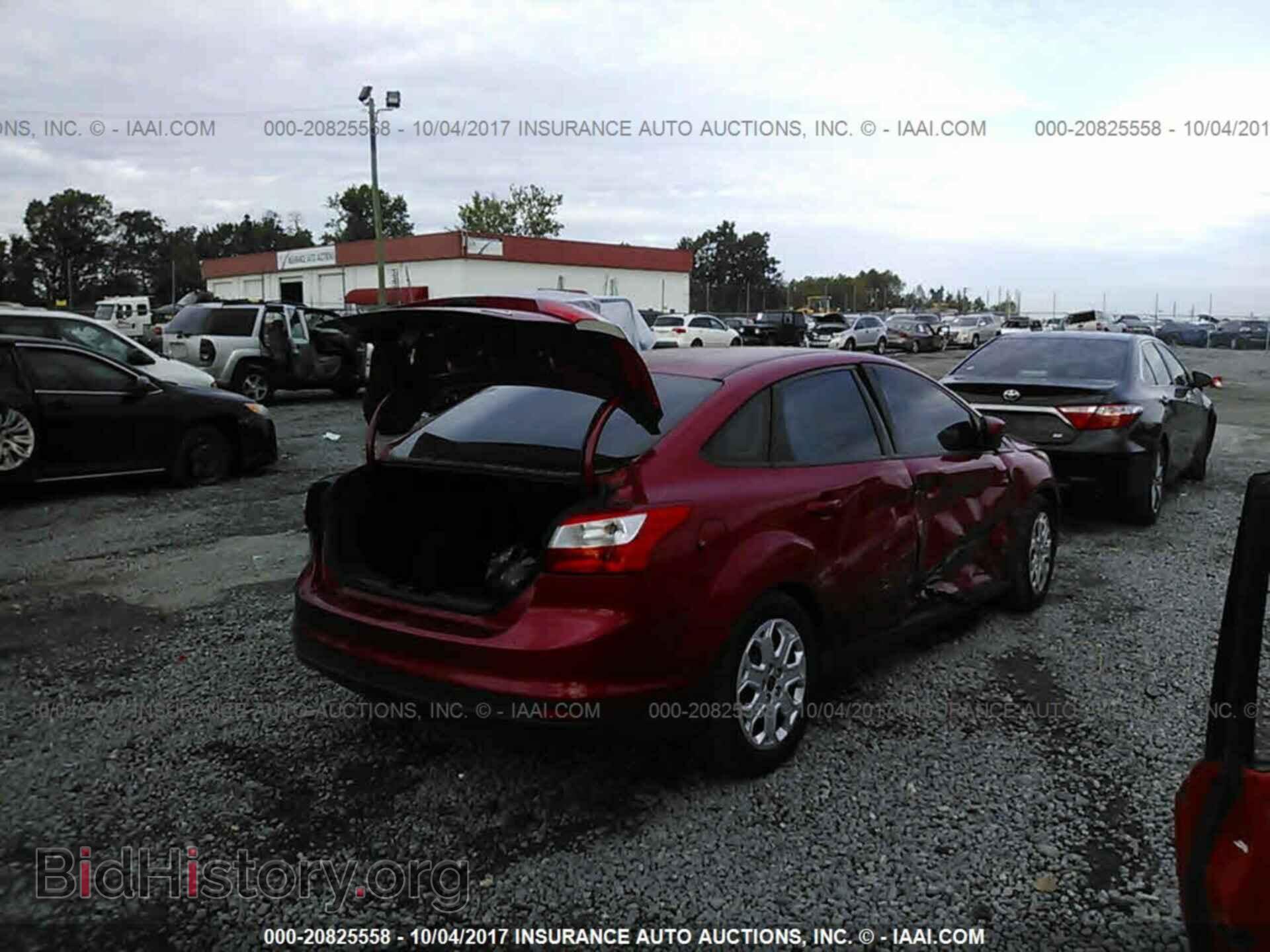 2012 Ford Focus - VIN: 1FAHP3F24CL466032 - Фото 4