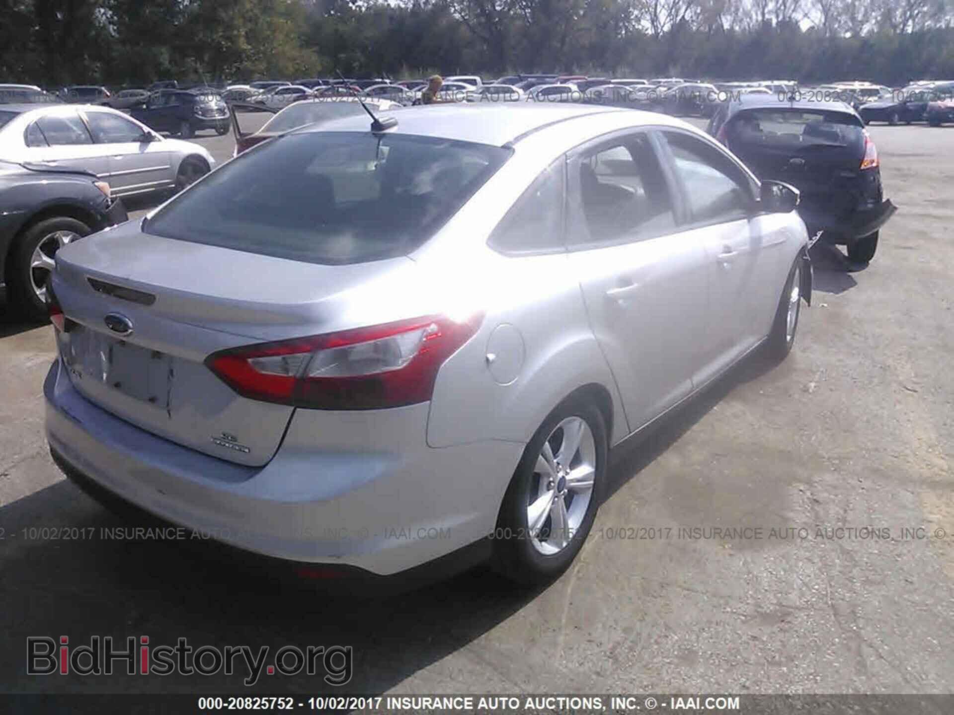 2014 Ford Focus - VIN: 1FADP3F28EL161750 - Фото 4