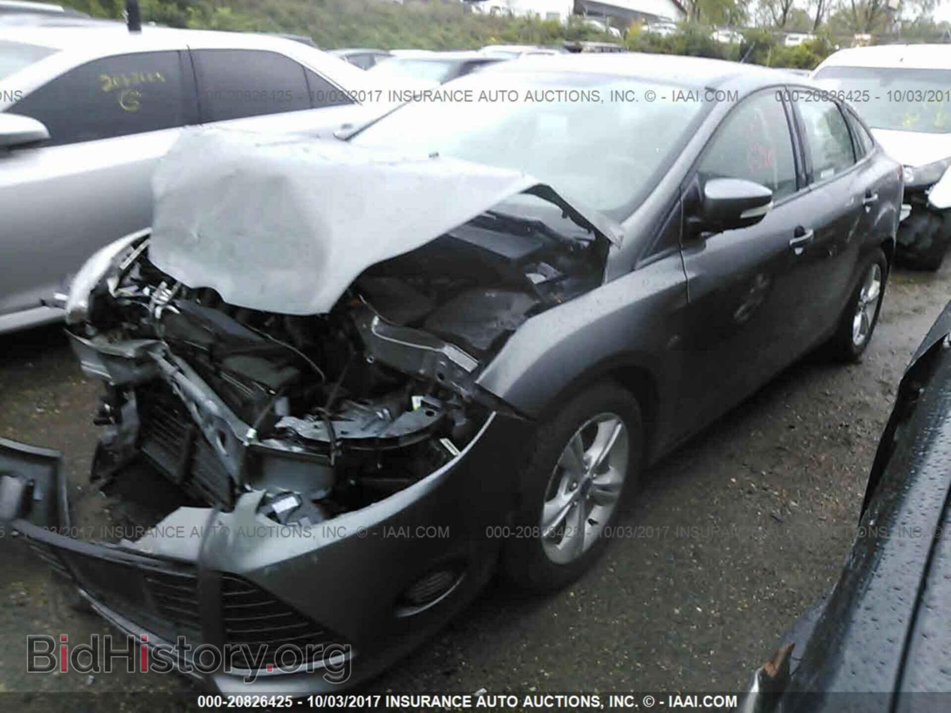 2014 Ford Focus - VIN: 1FADP3F29EL413554 - Фото 2
