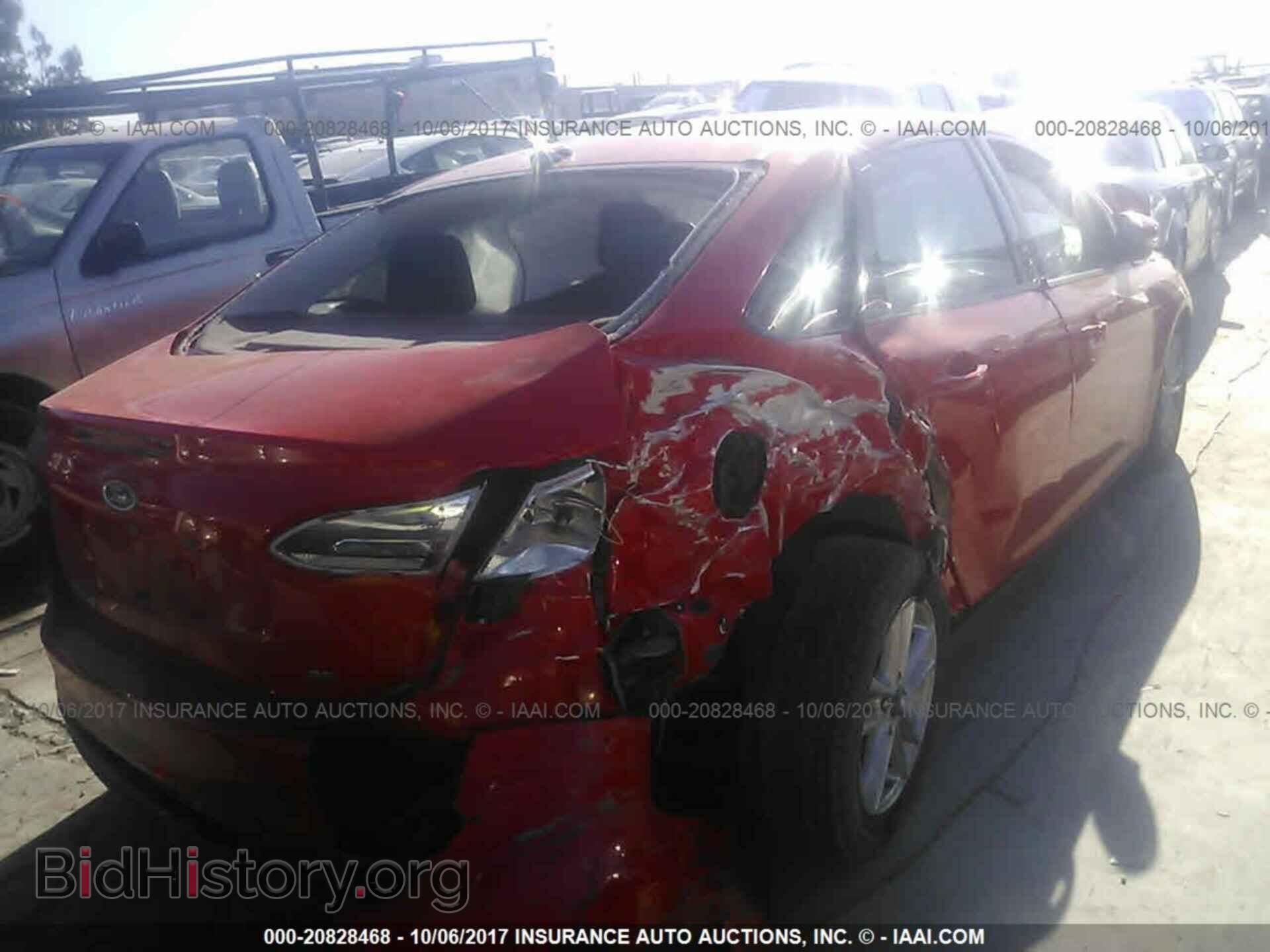 2016 Ford Focus - VIN: 1FADP3F28GL285410 - Photo 4
