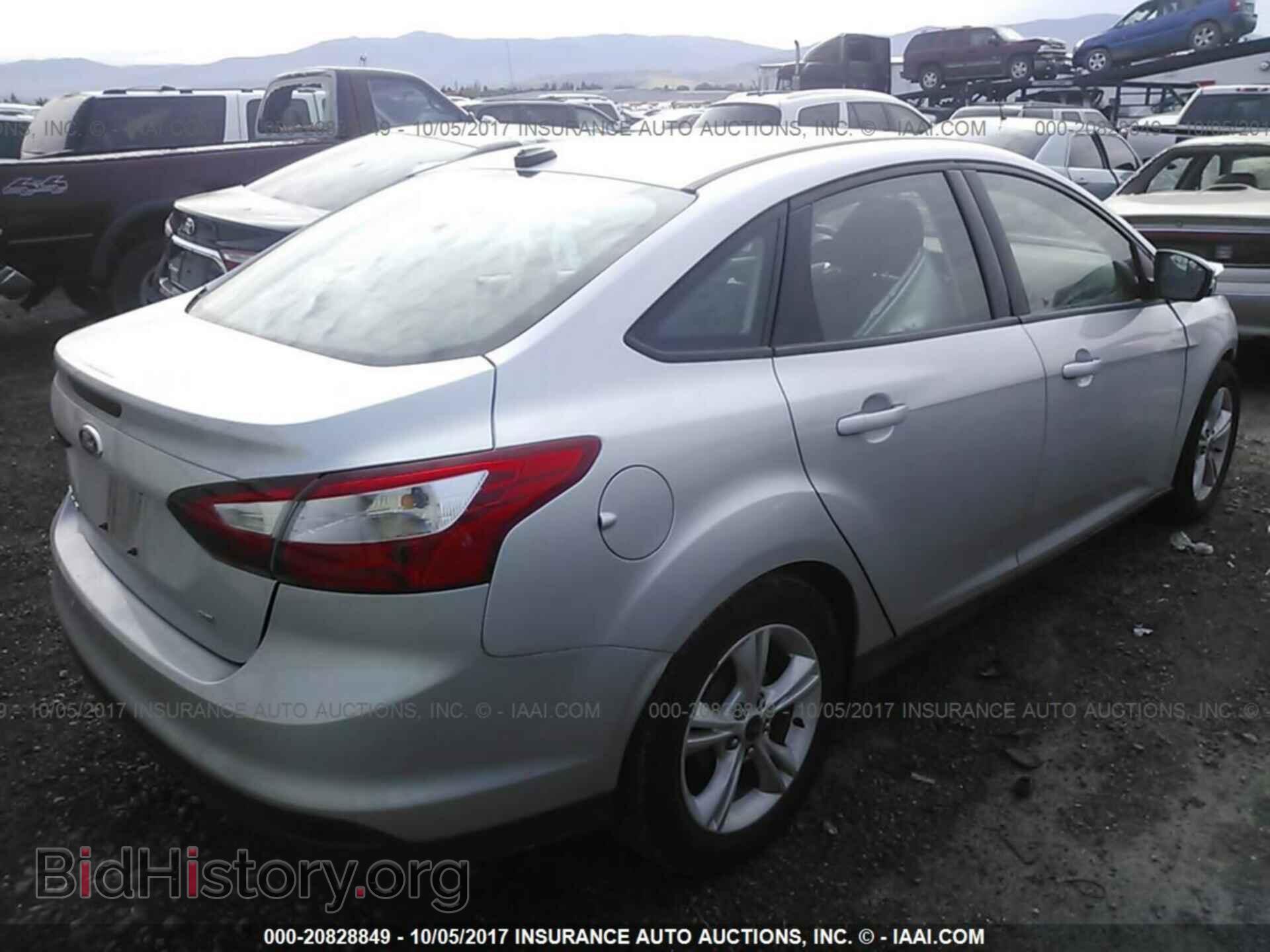 2014 Ford Focus - VIN: 1FADP3F28EL433357 - Фото 4
