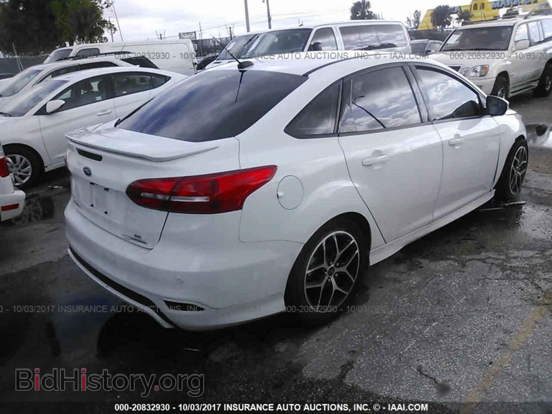 2015 Ford Focus - VIN: 1FADP3F28FL277760 - Photo 4
