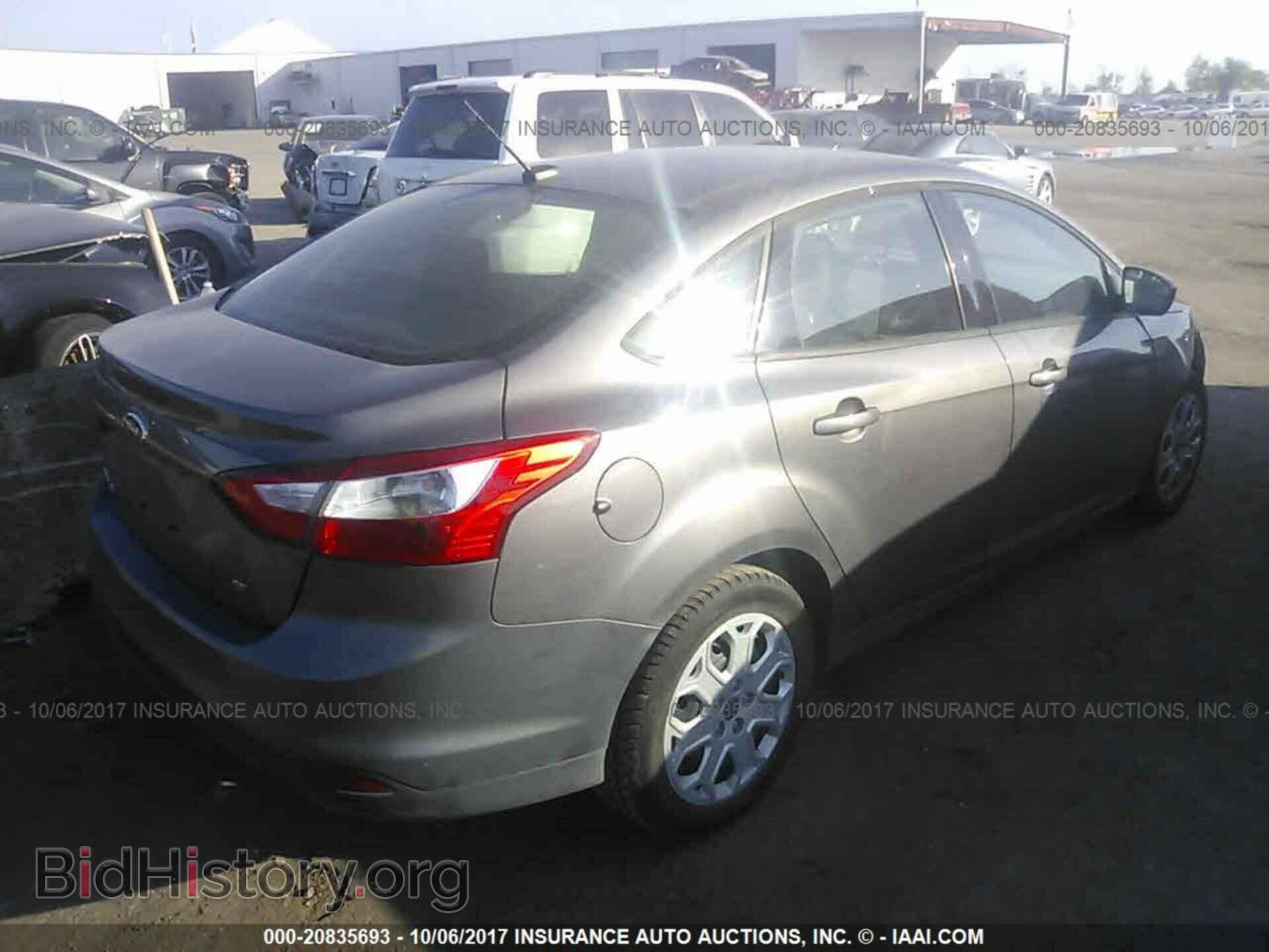 2012 Ford Focus - VIN: 1FAHP3F24CL293631 - Photo 4