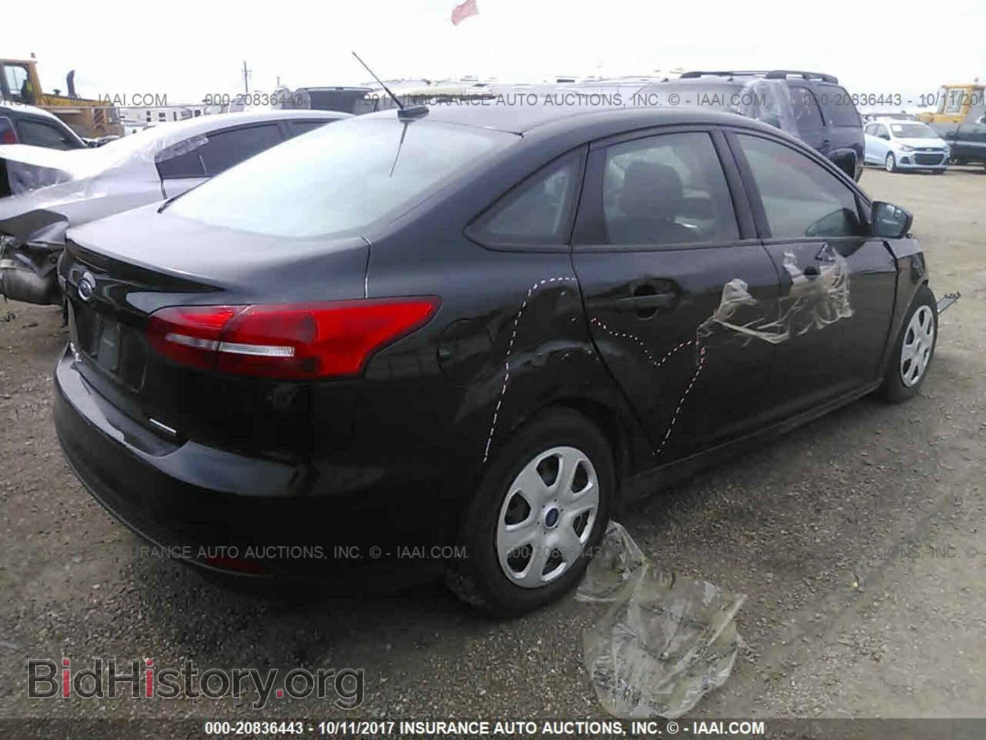 2015 Ford Focus - VIN: 1FADP3E22FL274743 - Photo 4