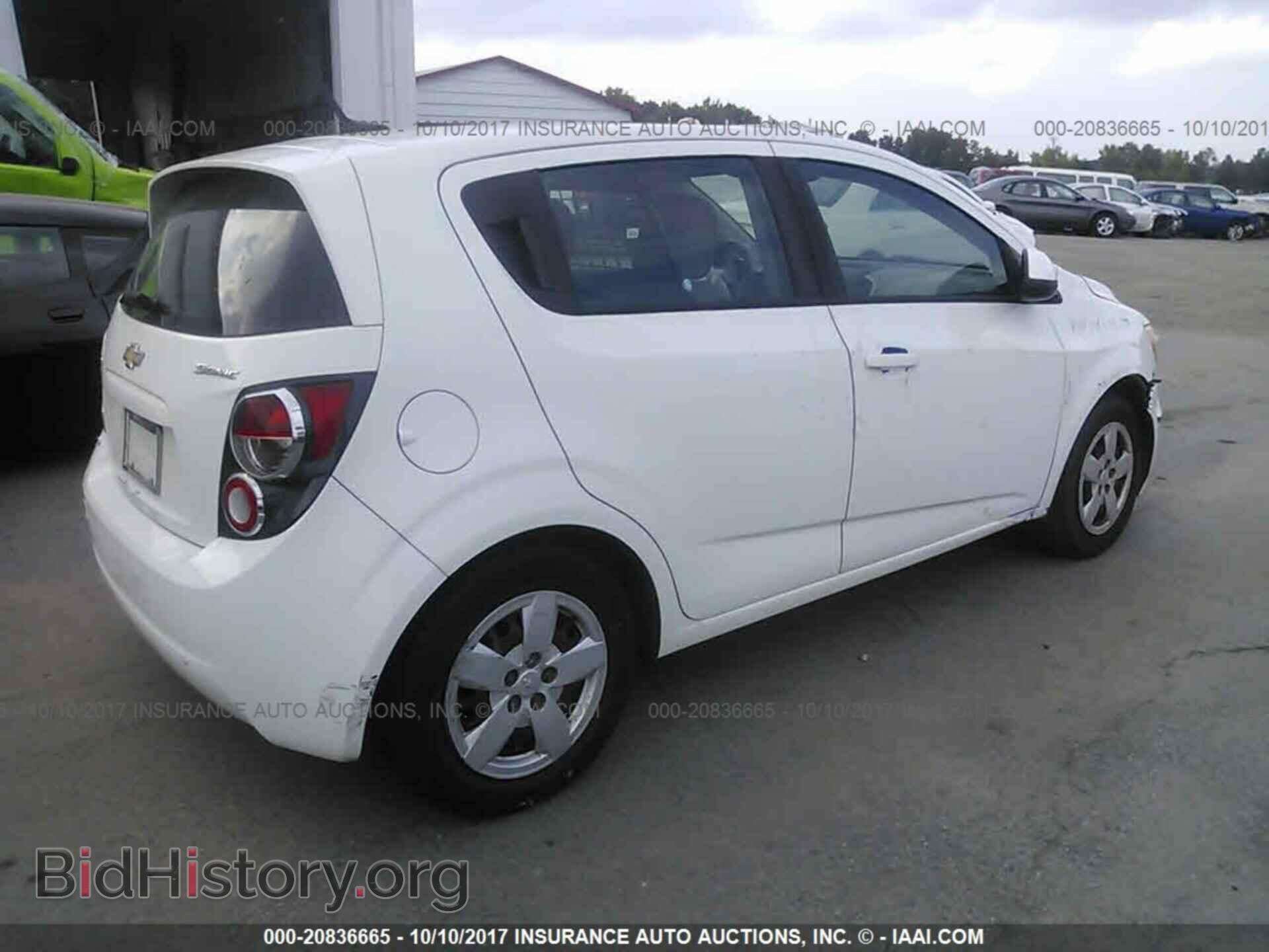 2014 Chevrolet Sonic - VIN: 1G1JA6SH4E4184682 - Фото 4