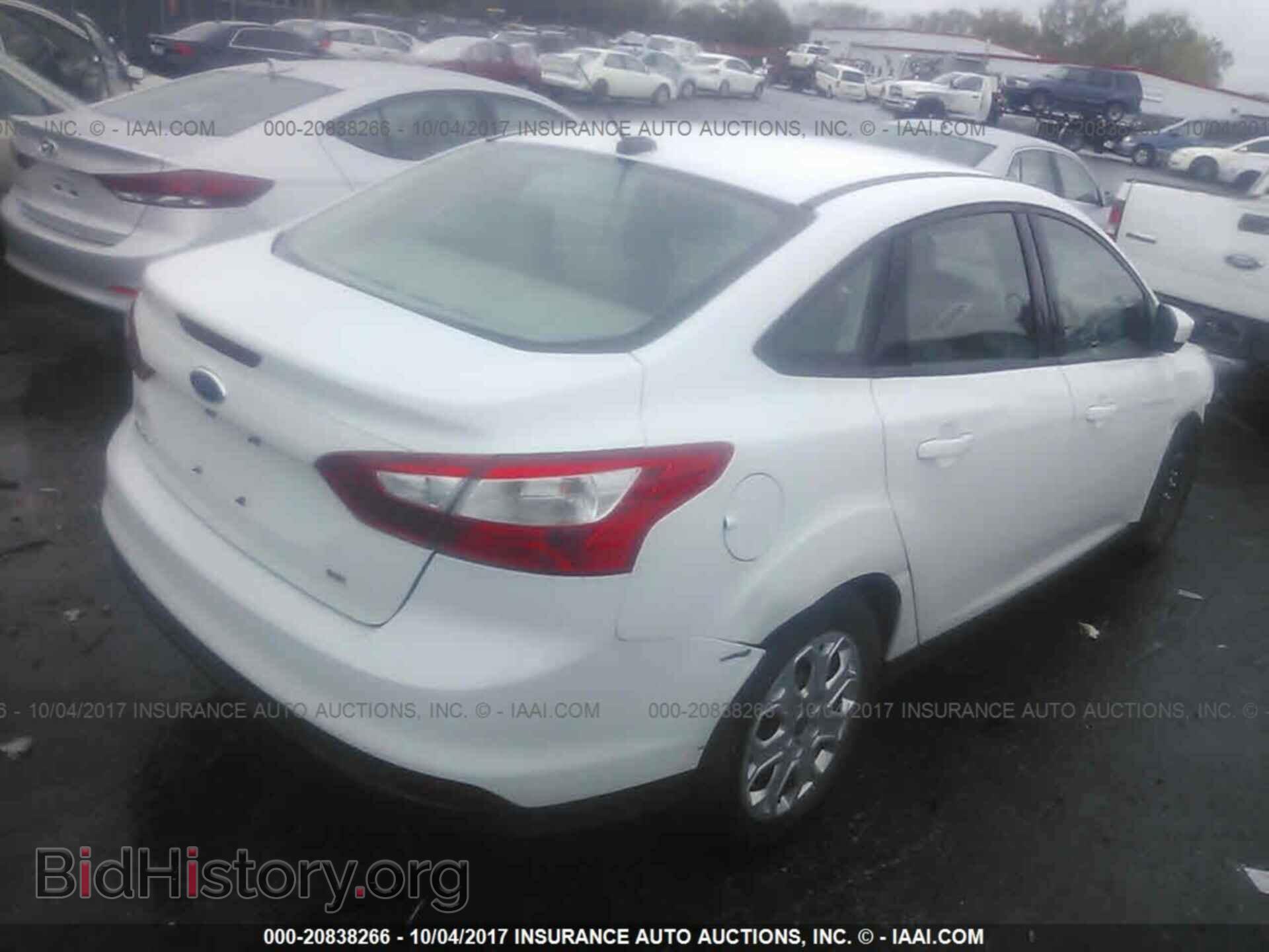 2012 Ford Focus - VIN: 1FAHP3F21CL313222 - Фото 4