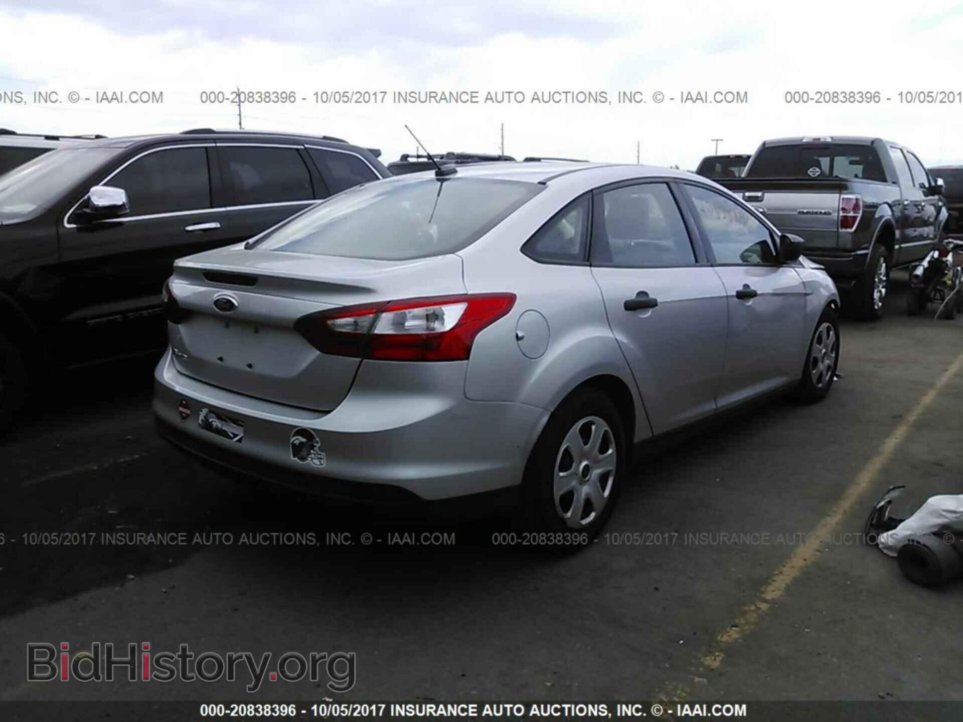 2012 Ford Focus - VIN: 1FAHP3E25CL330140 - Фото 4