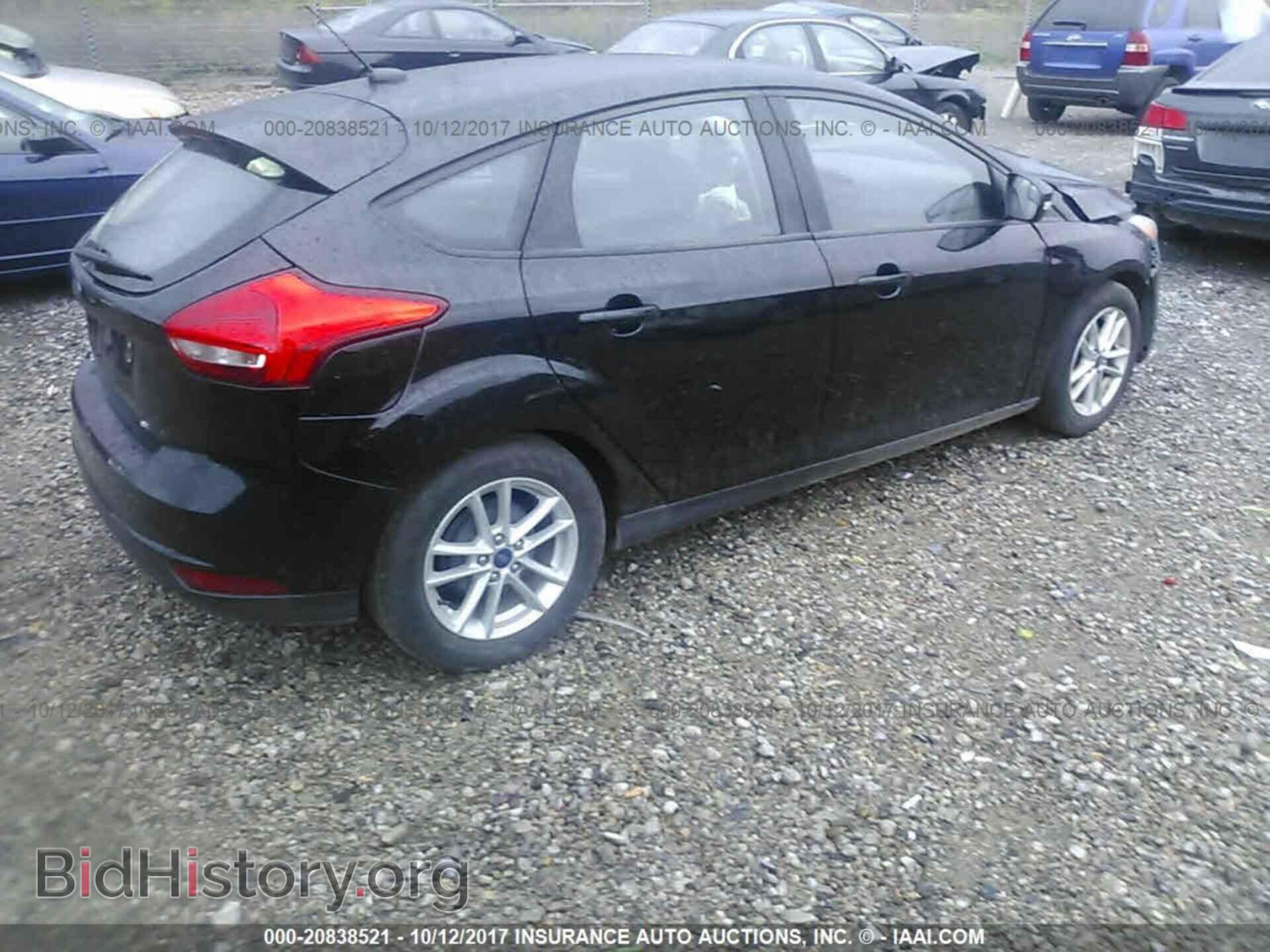 2016 Ford Focus - VIN: 1FADP3K25GL314402 - Фото 4