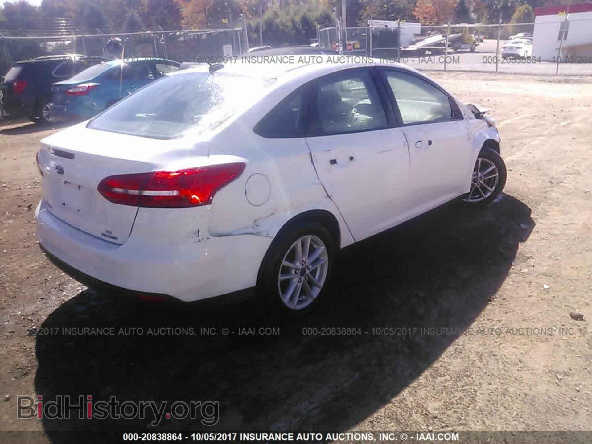 2015 Ford Focus - VIN: 1FADP3F24FL295382 - Фото 4