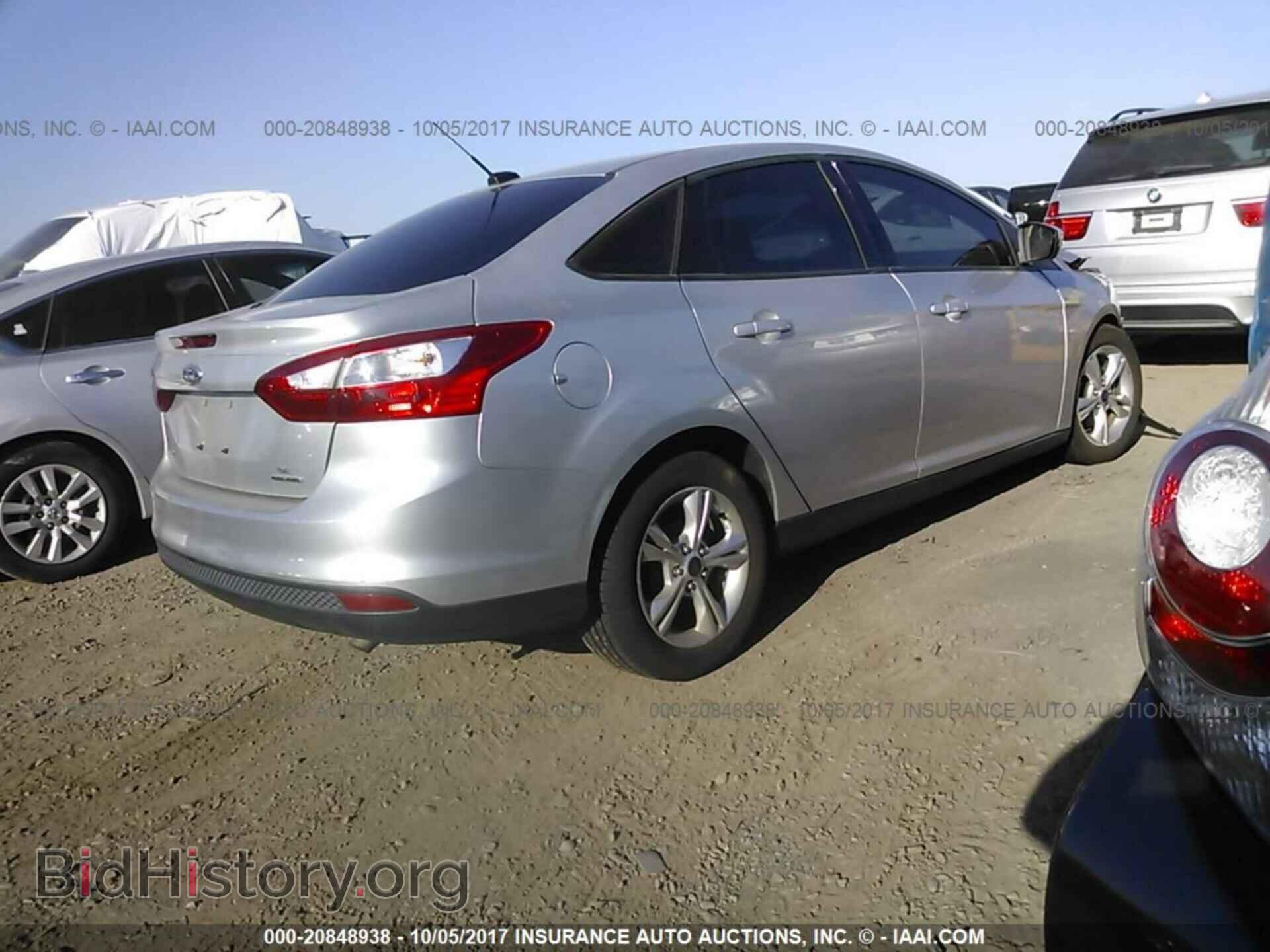 2013 Ford Focus - VIN: 1FADP3F21DL314628 - Photo 4