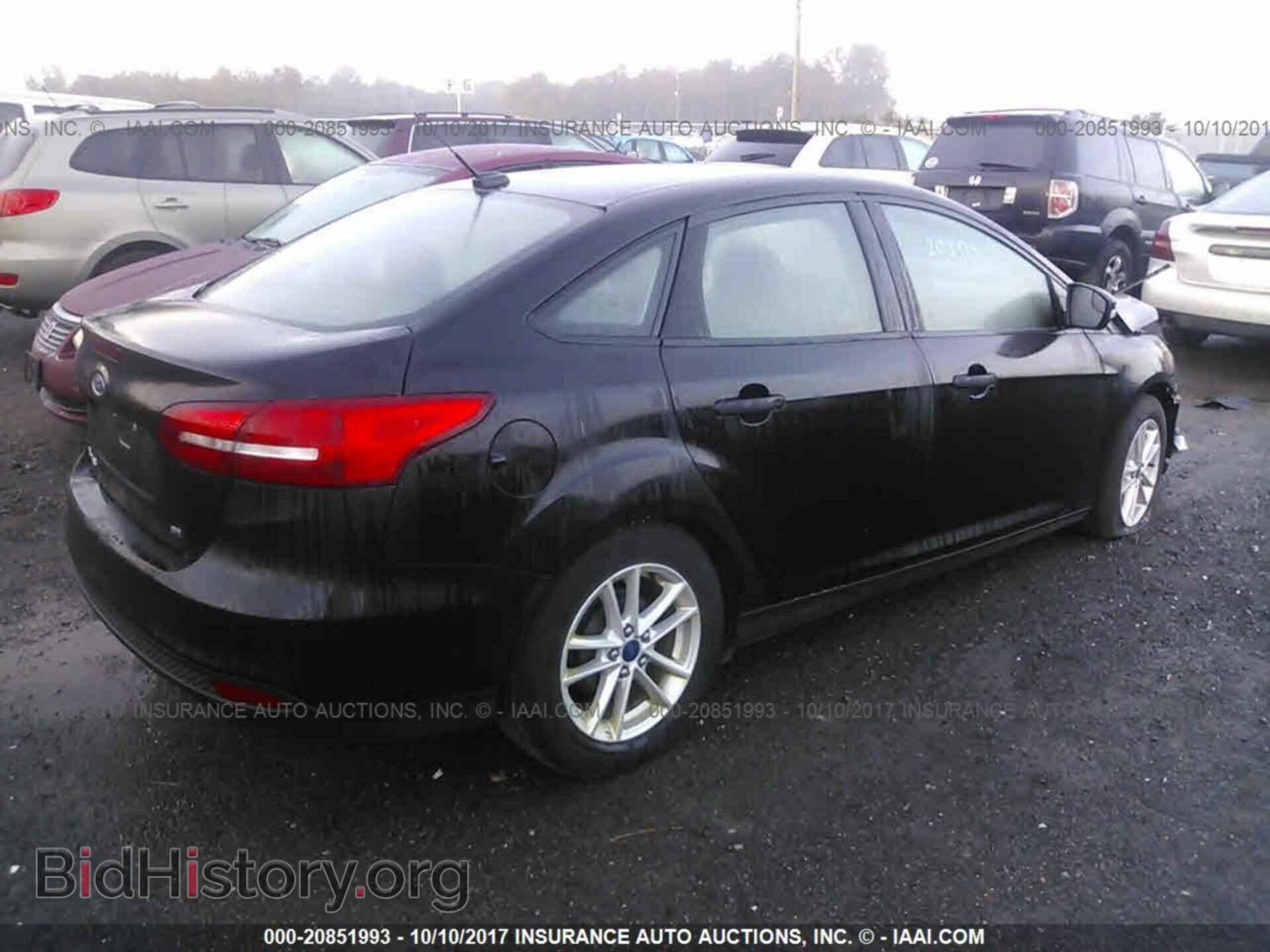 2016 Ford Focus - VIN: 1FADP3F21GL243435 - Photo 4