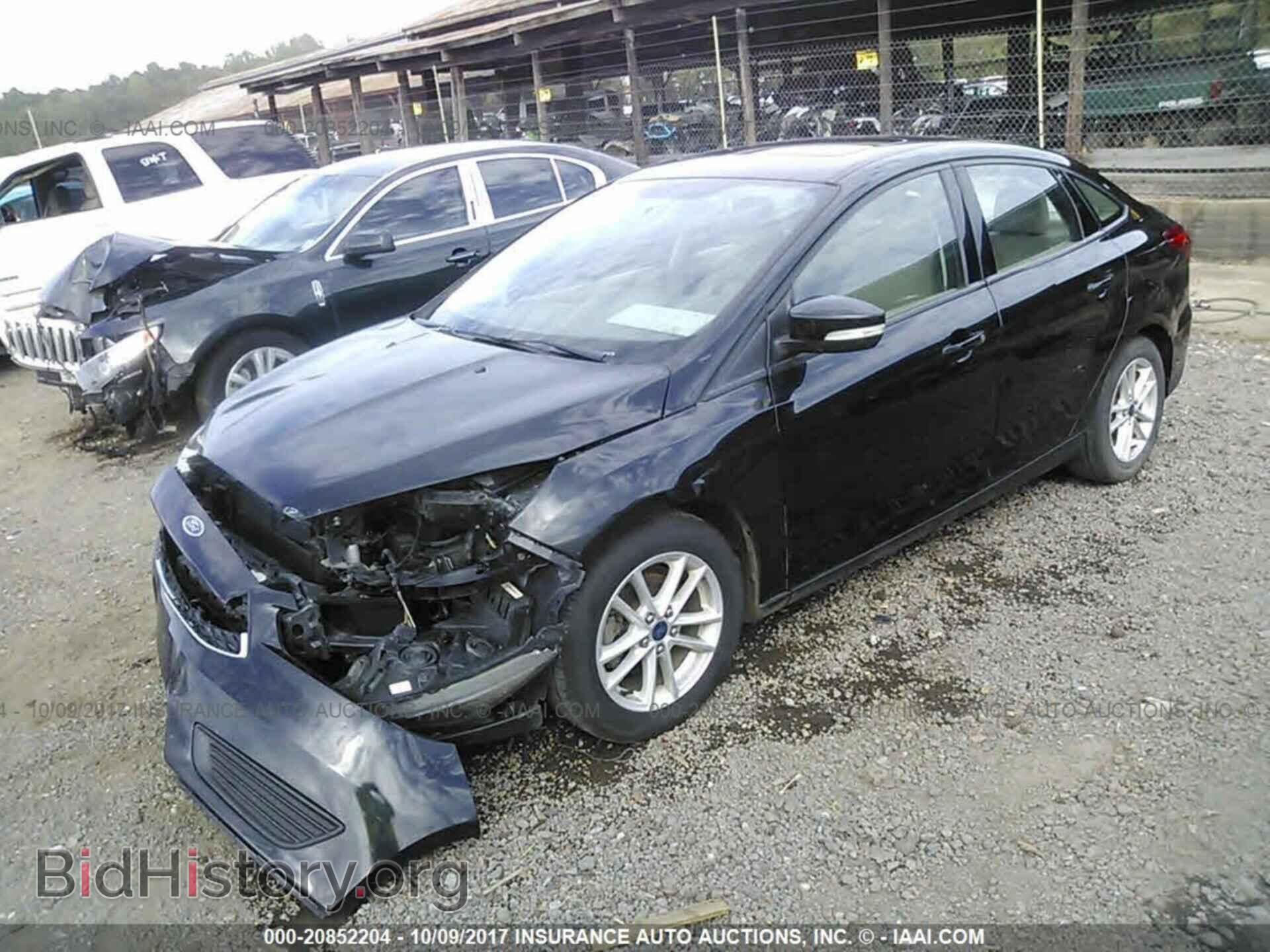 2015 Ford Focus - VIN: 1FADP3F21FL311540 - Photo 2