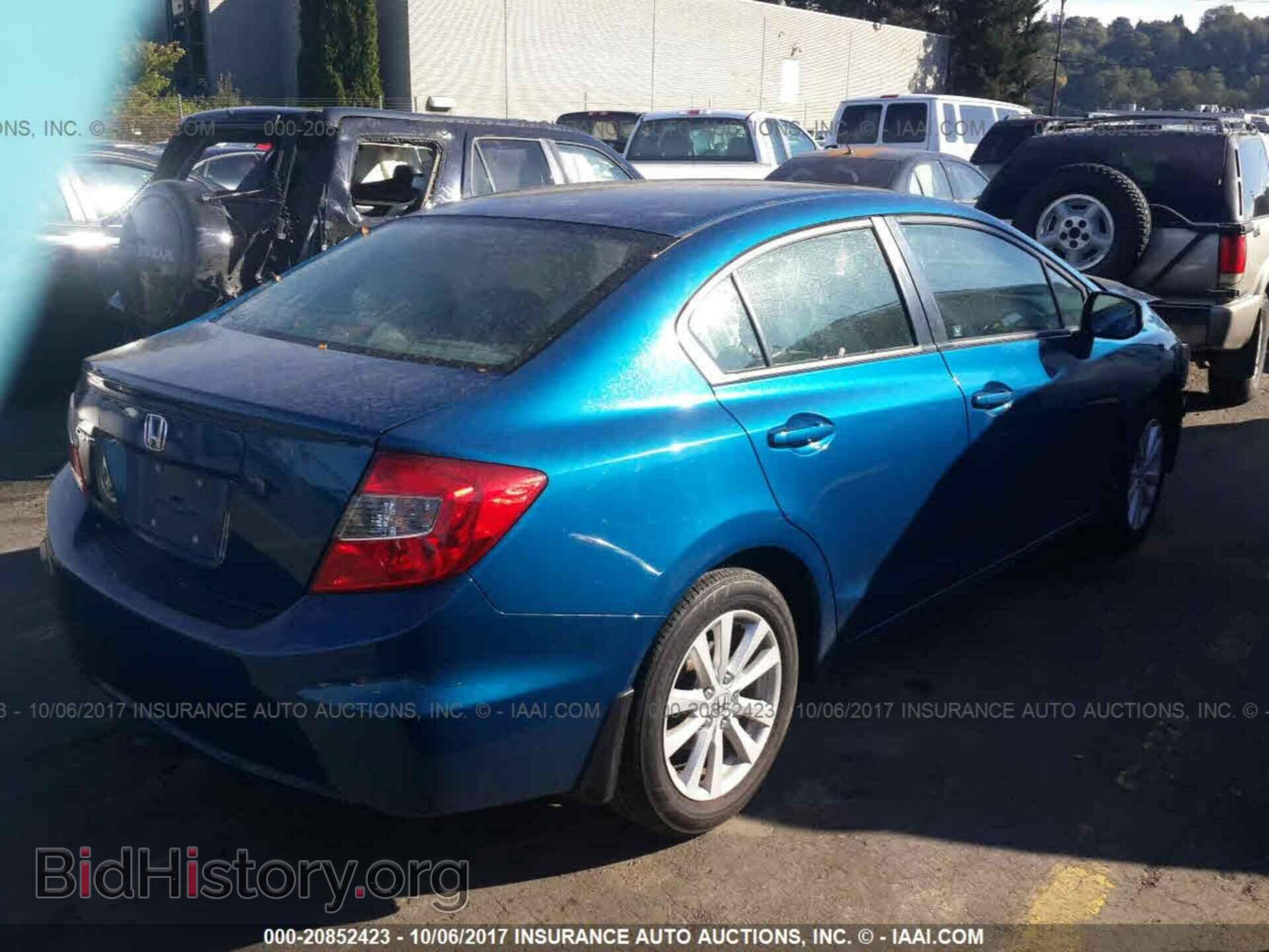 2012 Honda Civic - VIN: 2HGFB2F92CH554843 - Photo 4
