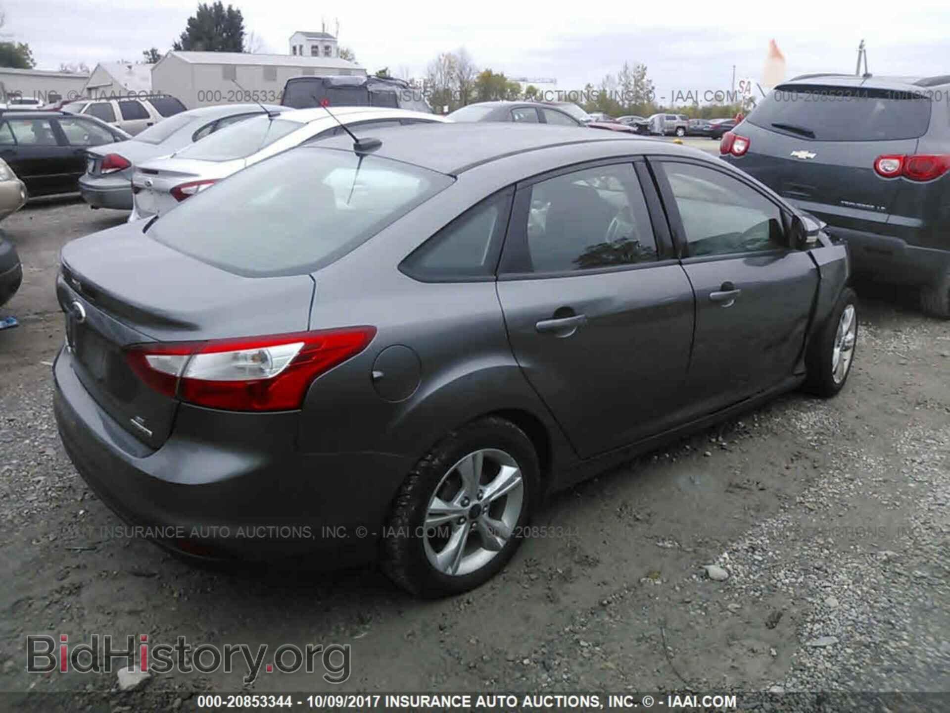 2013 Ford Focus - VIN: 1FADP3F21DL315472 - Фото 4