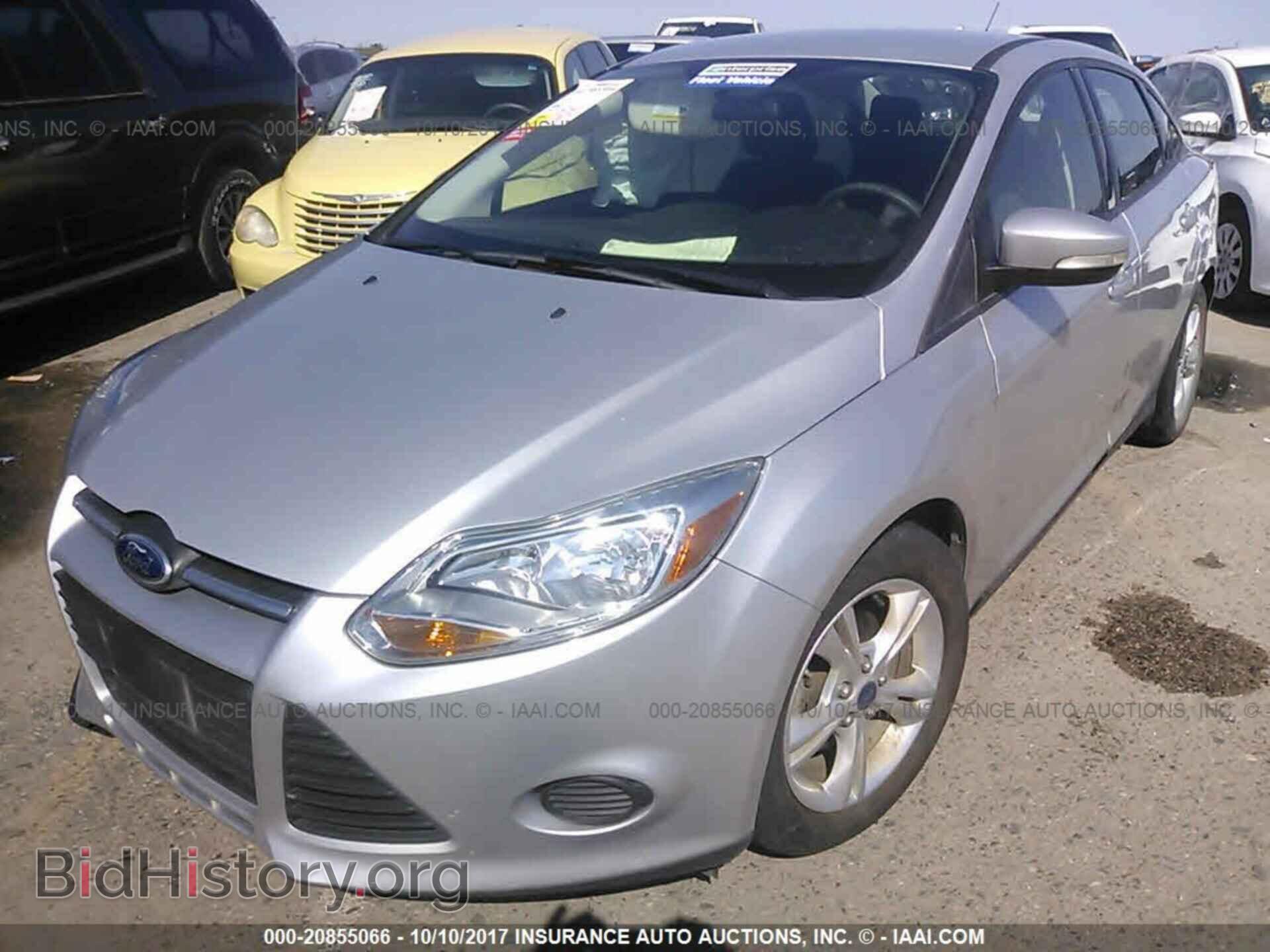 2014 Ford Focus - VIN: 1FADP3F27EL284729 - Фото 2