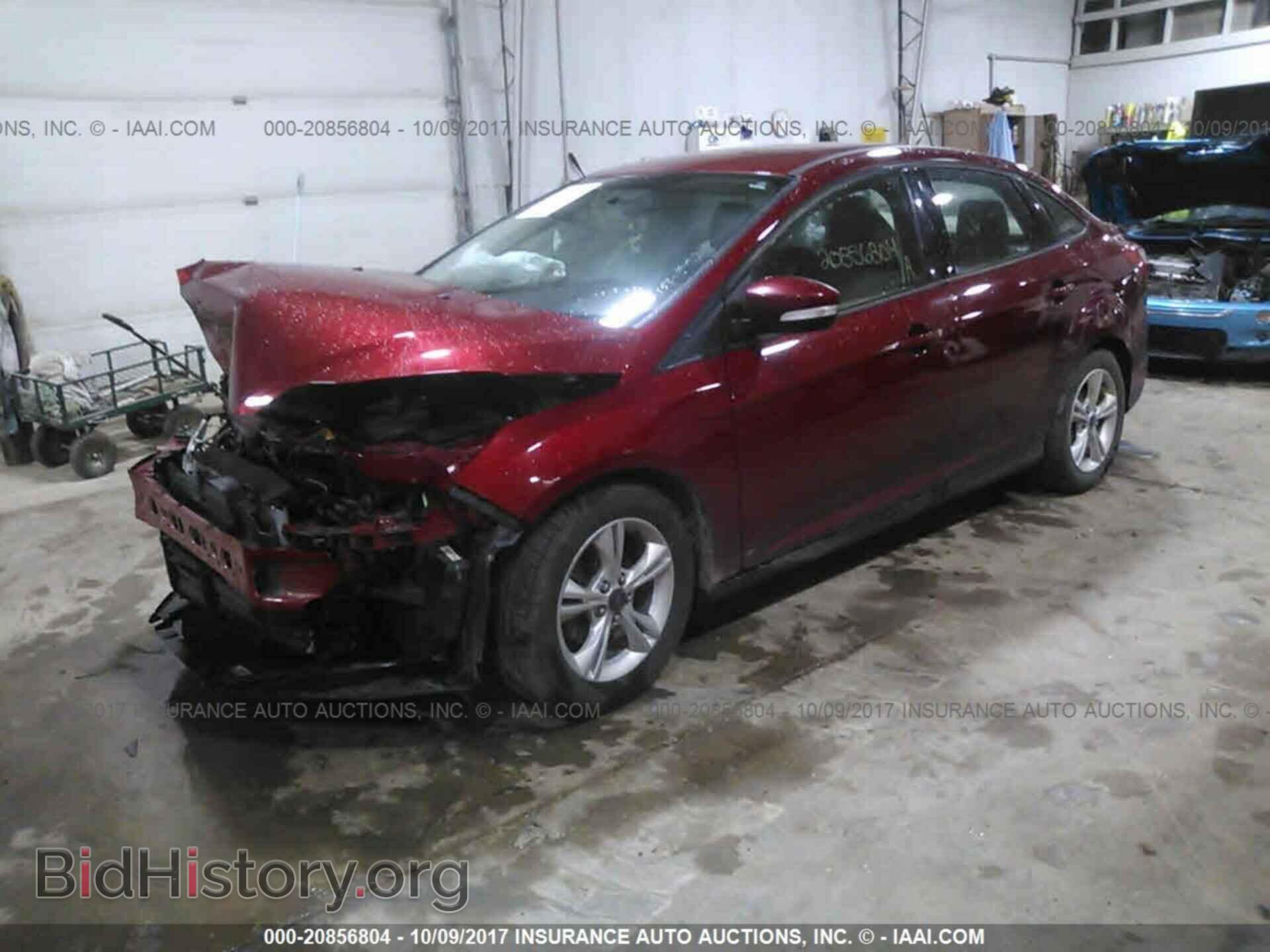 2014 Ford Focus - VIN: 1FADP3F27EL354102 - Фото 2