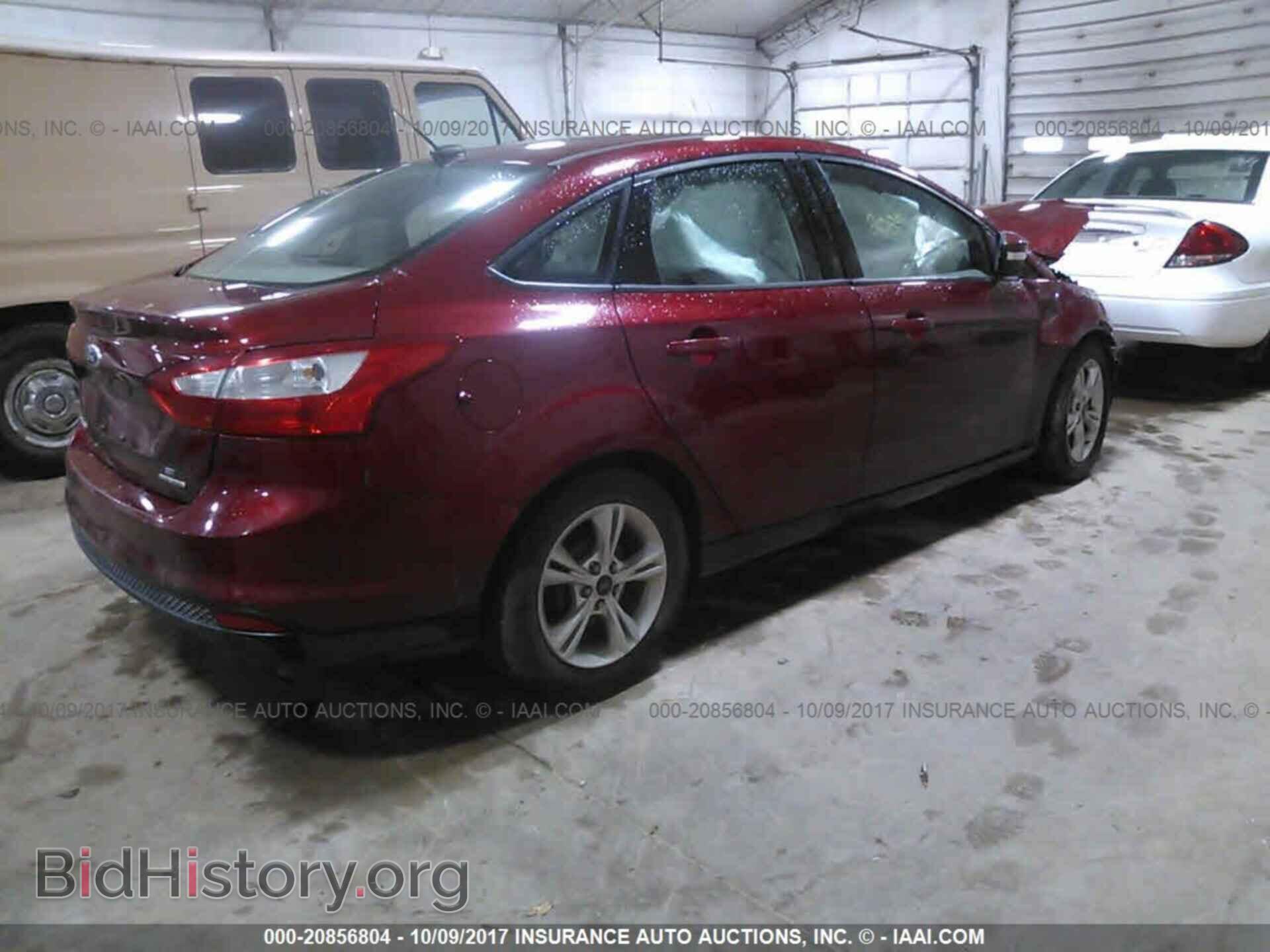 2014 Ford Focus - VIN: 1FADP3F27EL354102 - Фото 4
