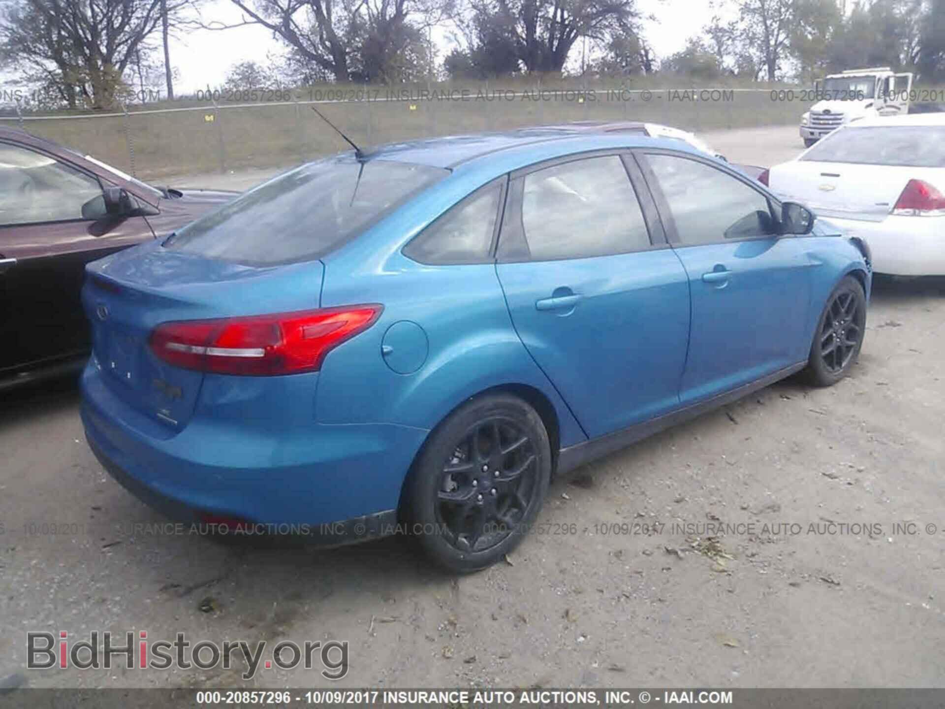 2016 Ford Focus - VIN: 1FADP3F22GL297410 - Photo 4