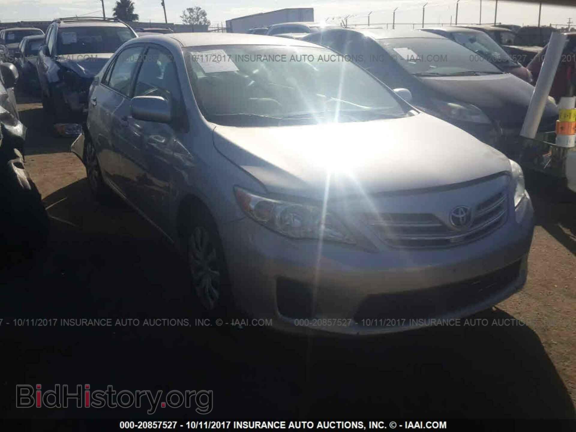 Фотография 2T1BU4EE8DC955178 - Toyota Corolla 2013
