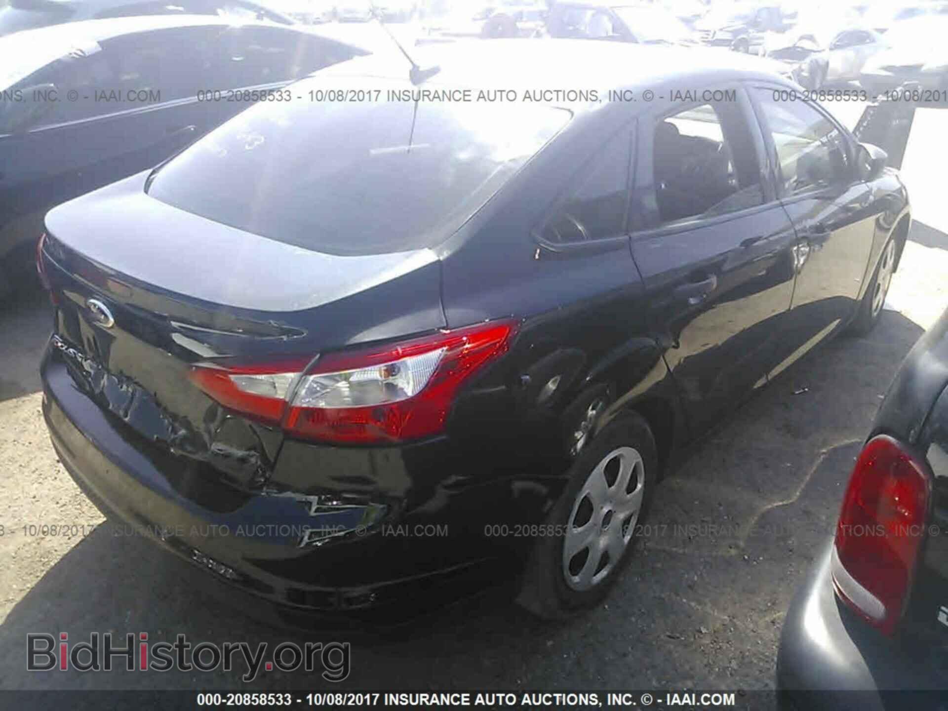 2014 Ford Focus - VIN: 1FADP3E24EL389990 - Photo 4