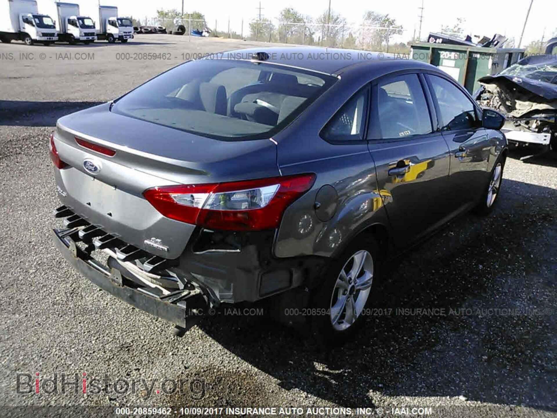 2014 Ford Focus - VIN: 1FADP3F28EL448778 - Фото 4