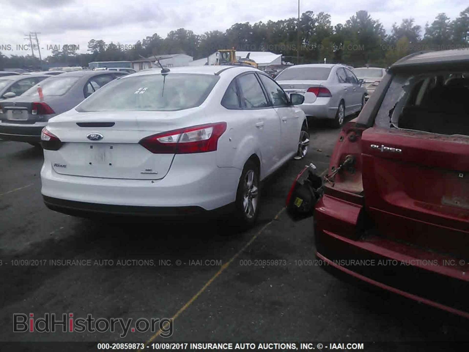 2014 Ford Focus - VIN: 1FADP3F22EL238662 - Photo 4