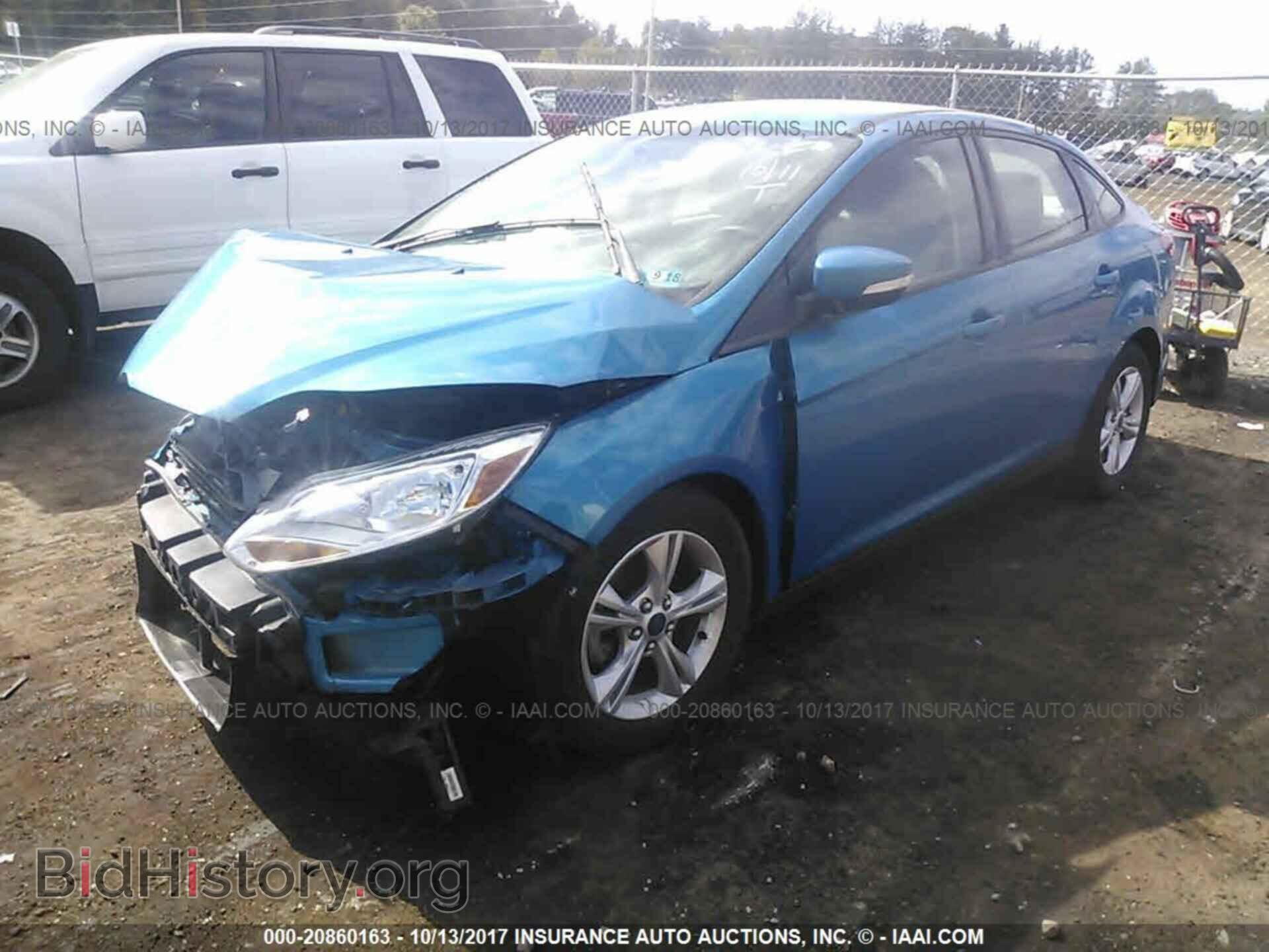 2014 Ford Focus - VIN: 1FADP3F21EL339501 - Photo 2