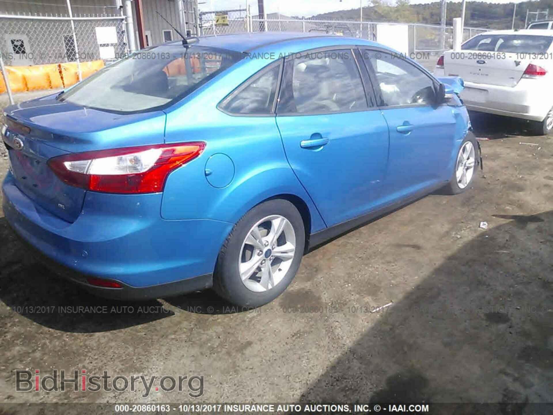 2014 Ford Focus - VIN: 1FADP3F21EL339501 - Photo 4