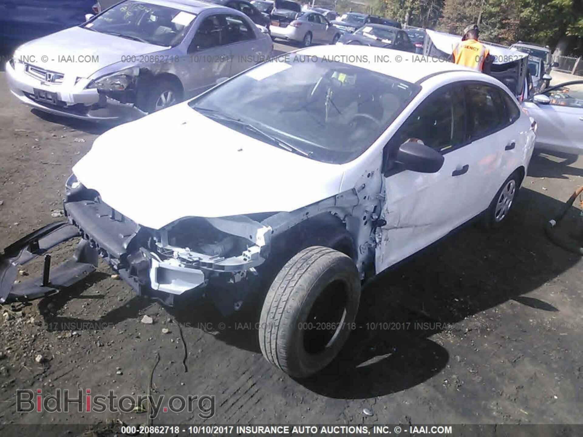 2014 Ford Focus - VIN: 1FADP3E25EL339390 - Фото 2
