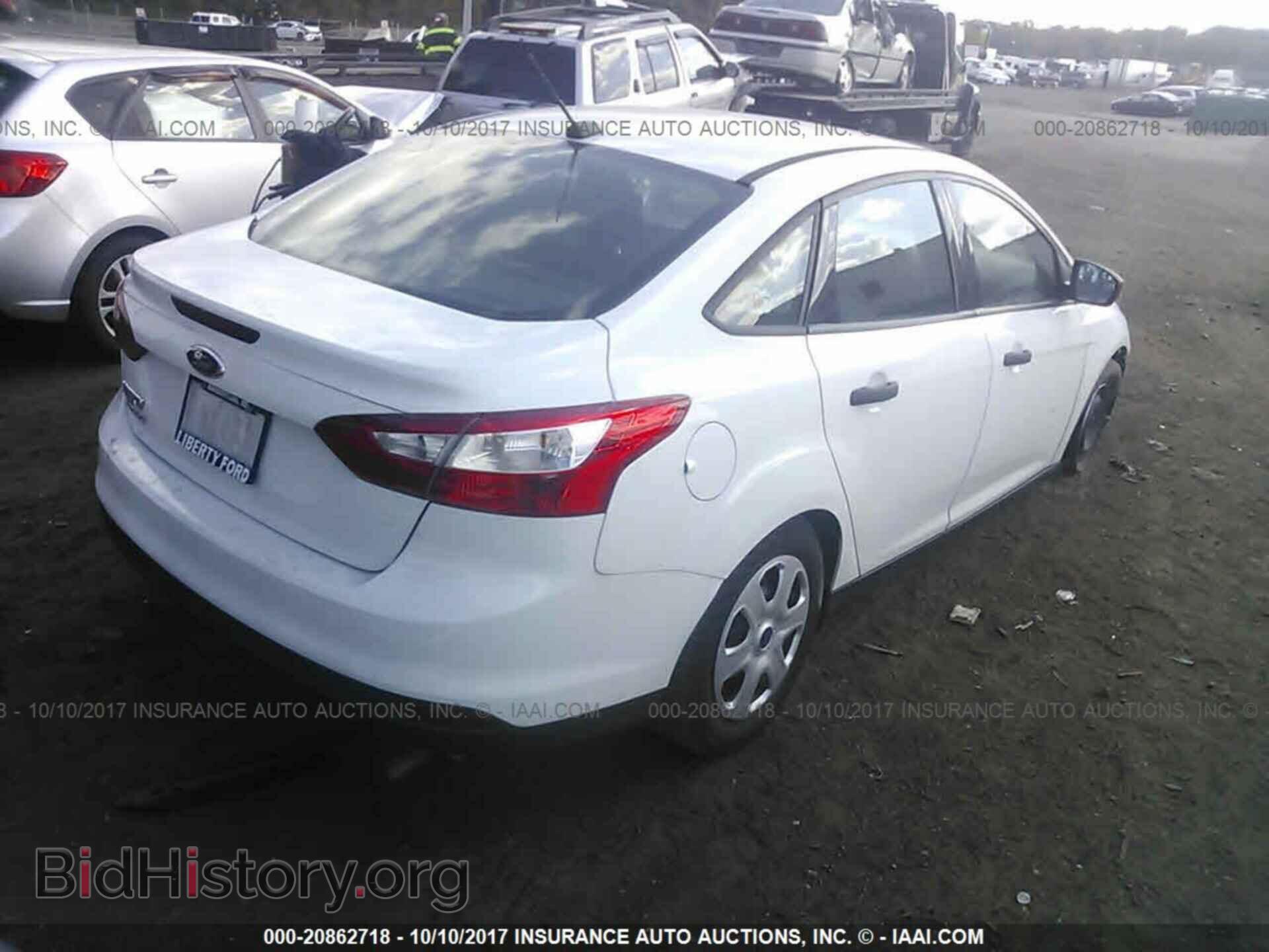 2014 Ford Focus - VIN: 1FADP3E25EL339390 - Фото 4
