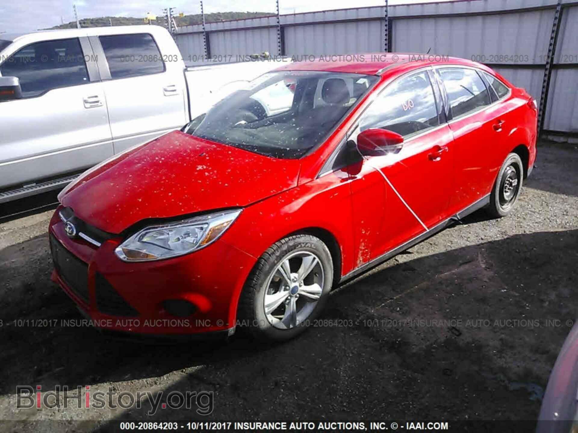 2013 Ford Focus - VIN: 1FADP3F21DL138034 - Photo 2