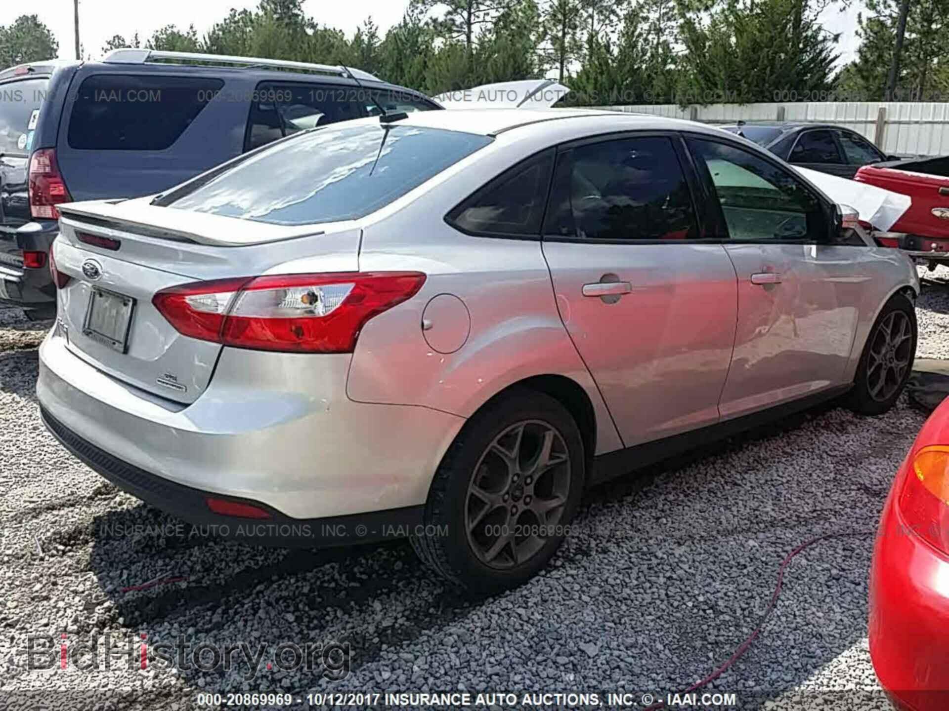 2013 Ford Focus - VIN: 1FADP3F24DL349728 - Photo 4