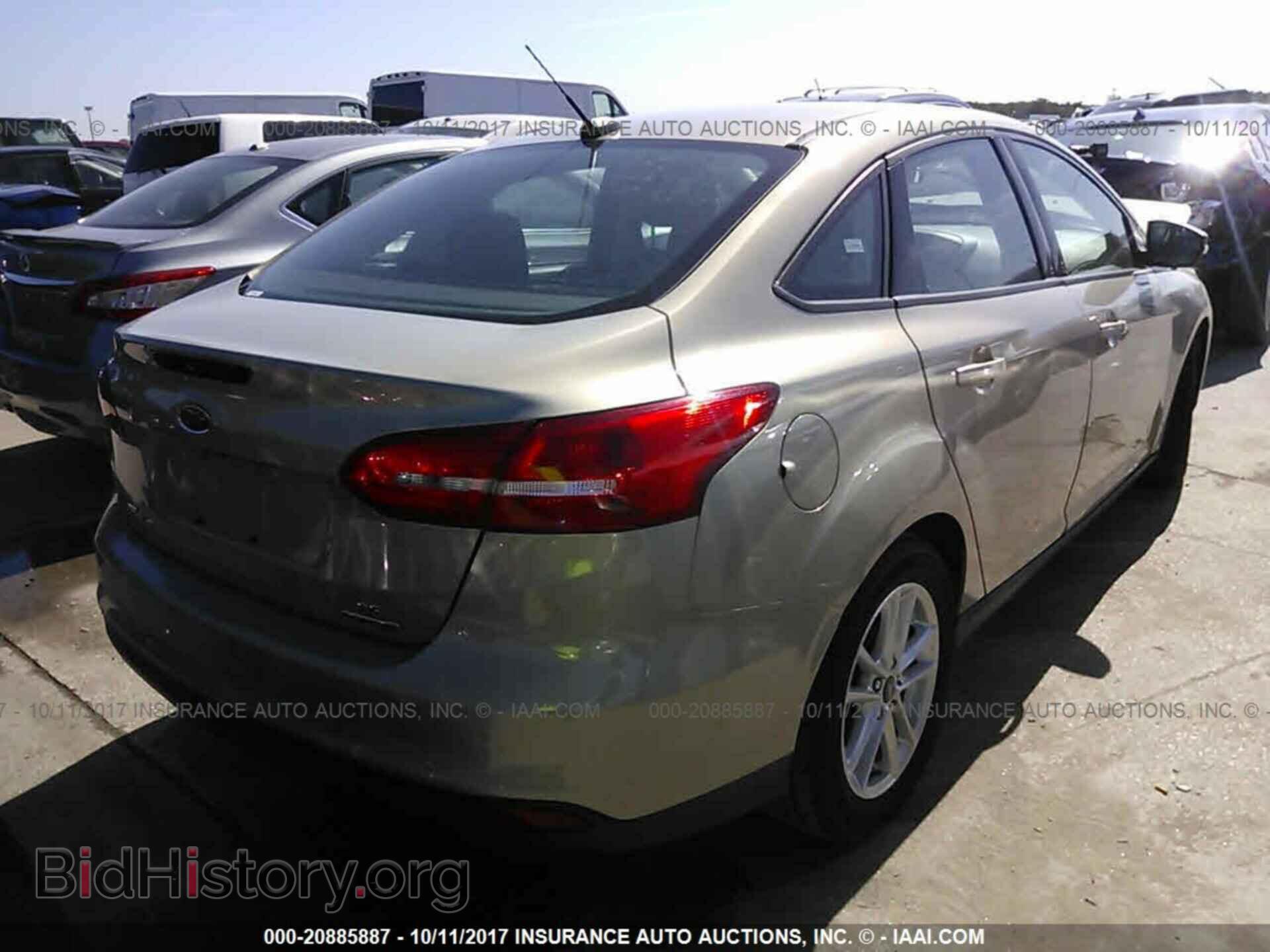 2016 Ford Focus - VIN: 1FADP3F20GL290312 - Photo 4