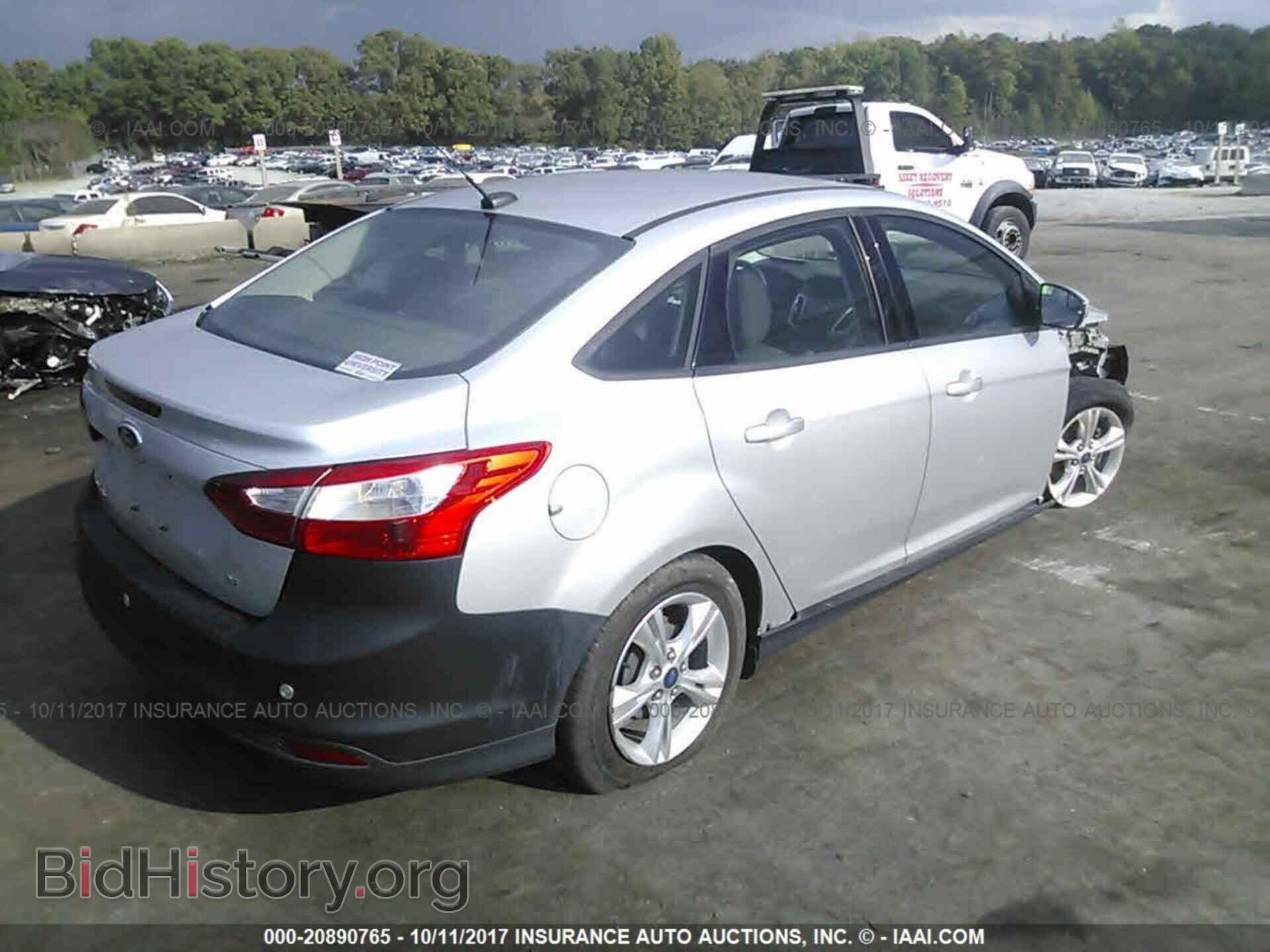 2014 Ford Focus - VIN: 1FADP3F22EL159038 - Photo 4