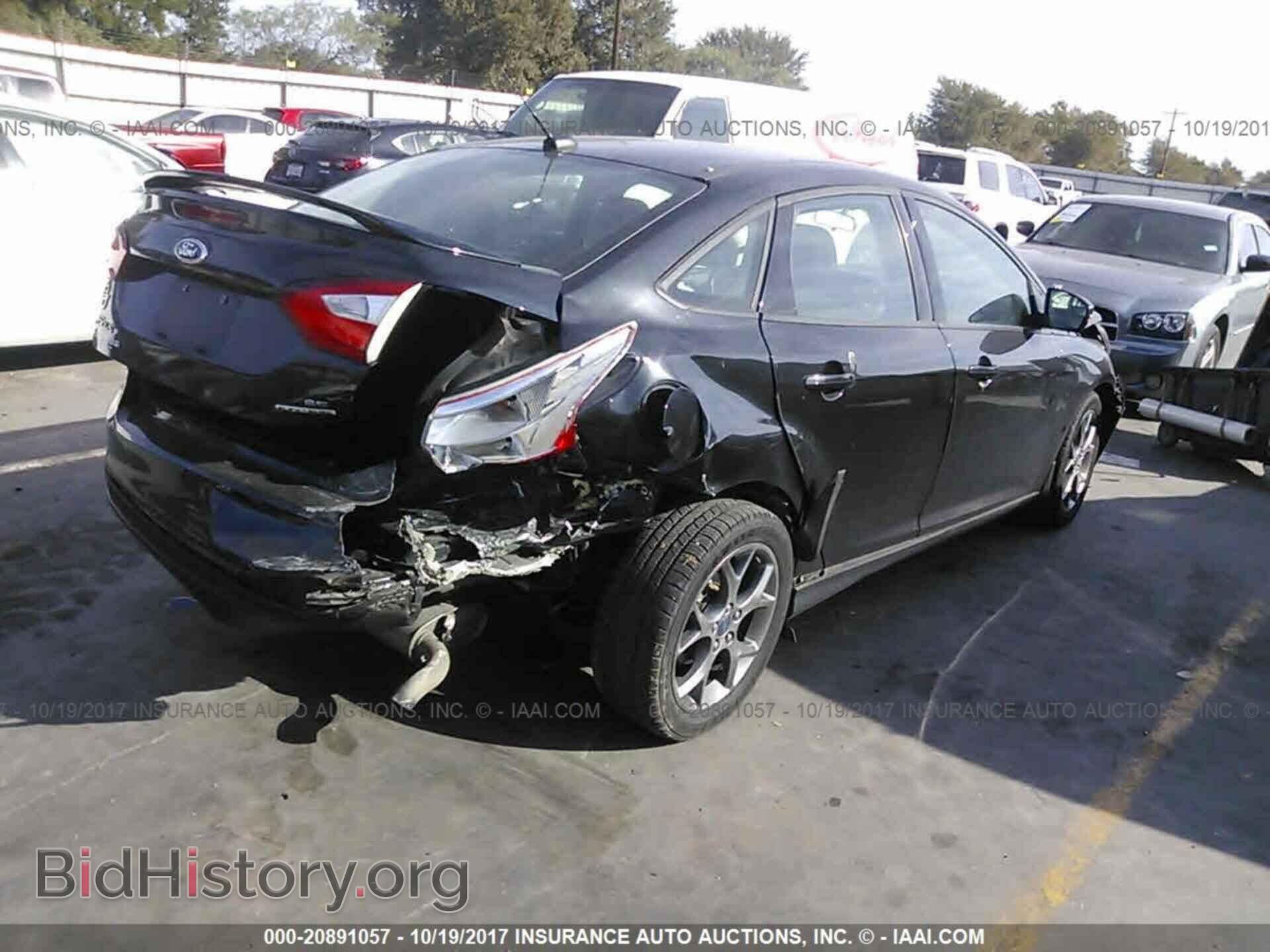 2013 Ford Focus - VIN: 1FADP3F21DL344874 - Photo 4