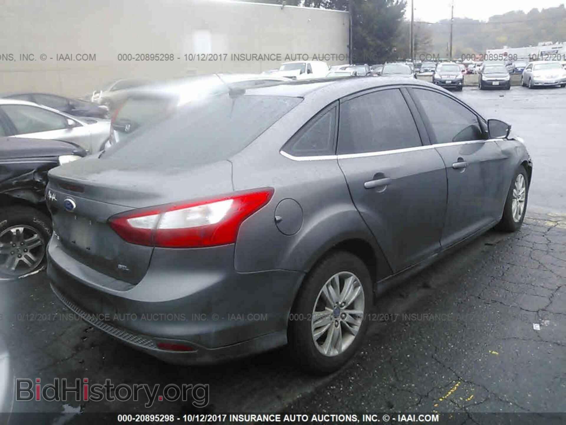 2012 Ford Focus - VIN: 1FAHP3H24CL252400 - Photo 4