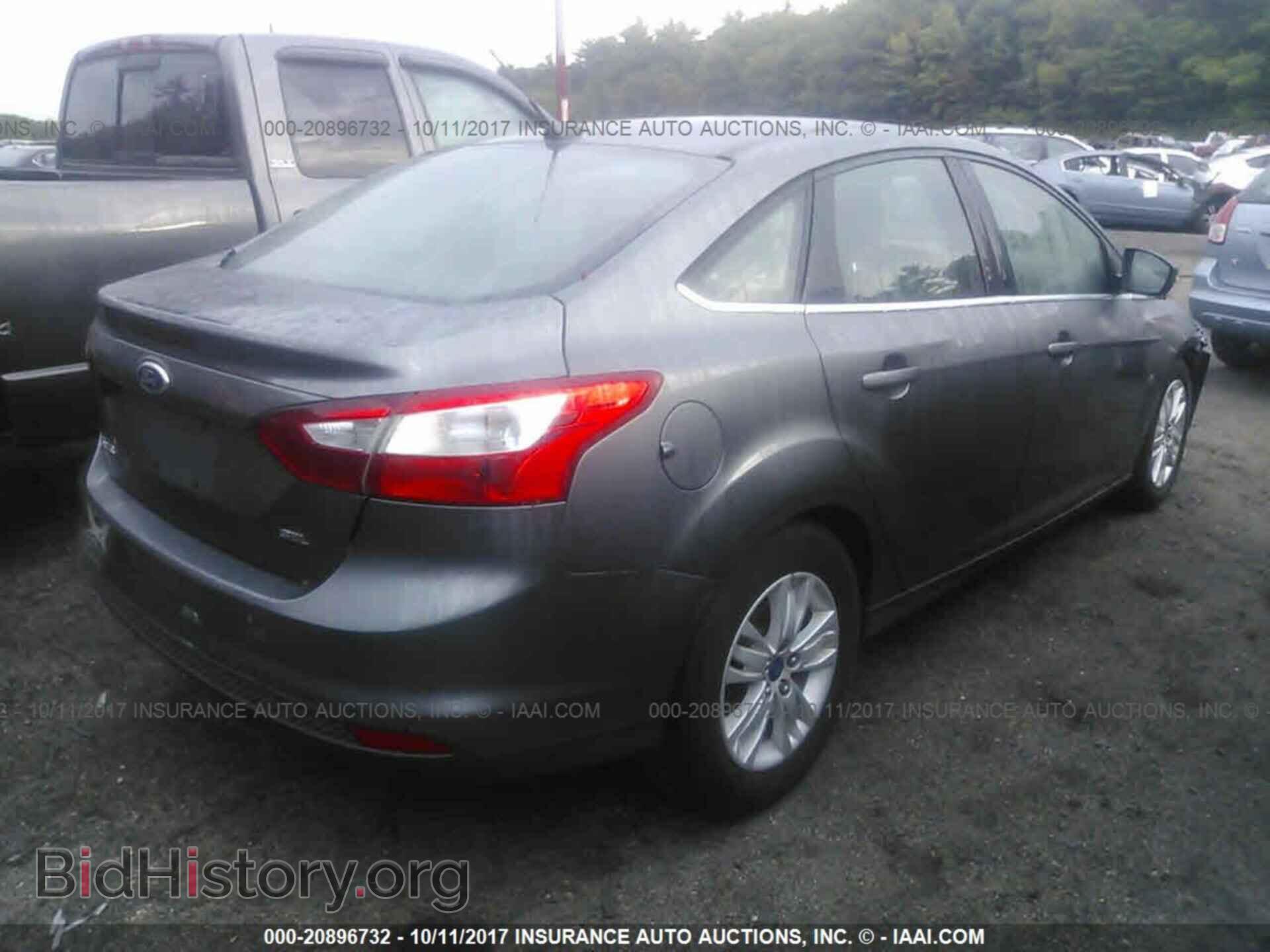 2012 Ford Focus - VIN: 1FAHP3H27CL331897 - Photo 4